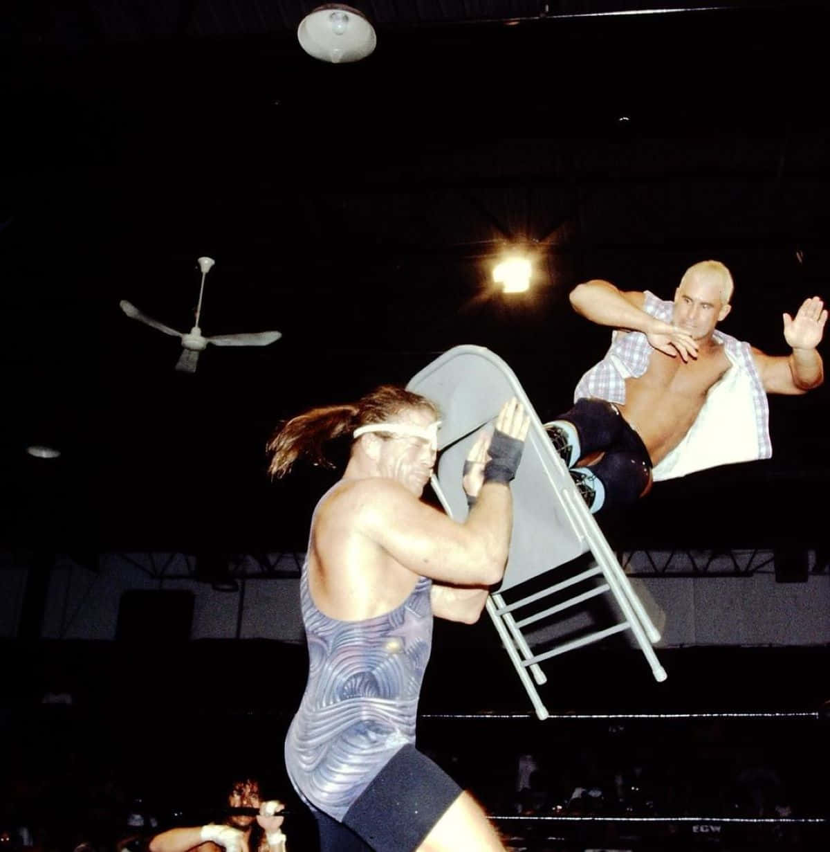 Wrestling_ Chair_ Smash_ Action Background
