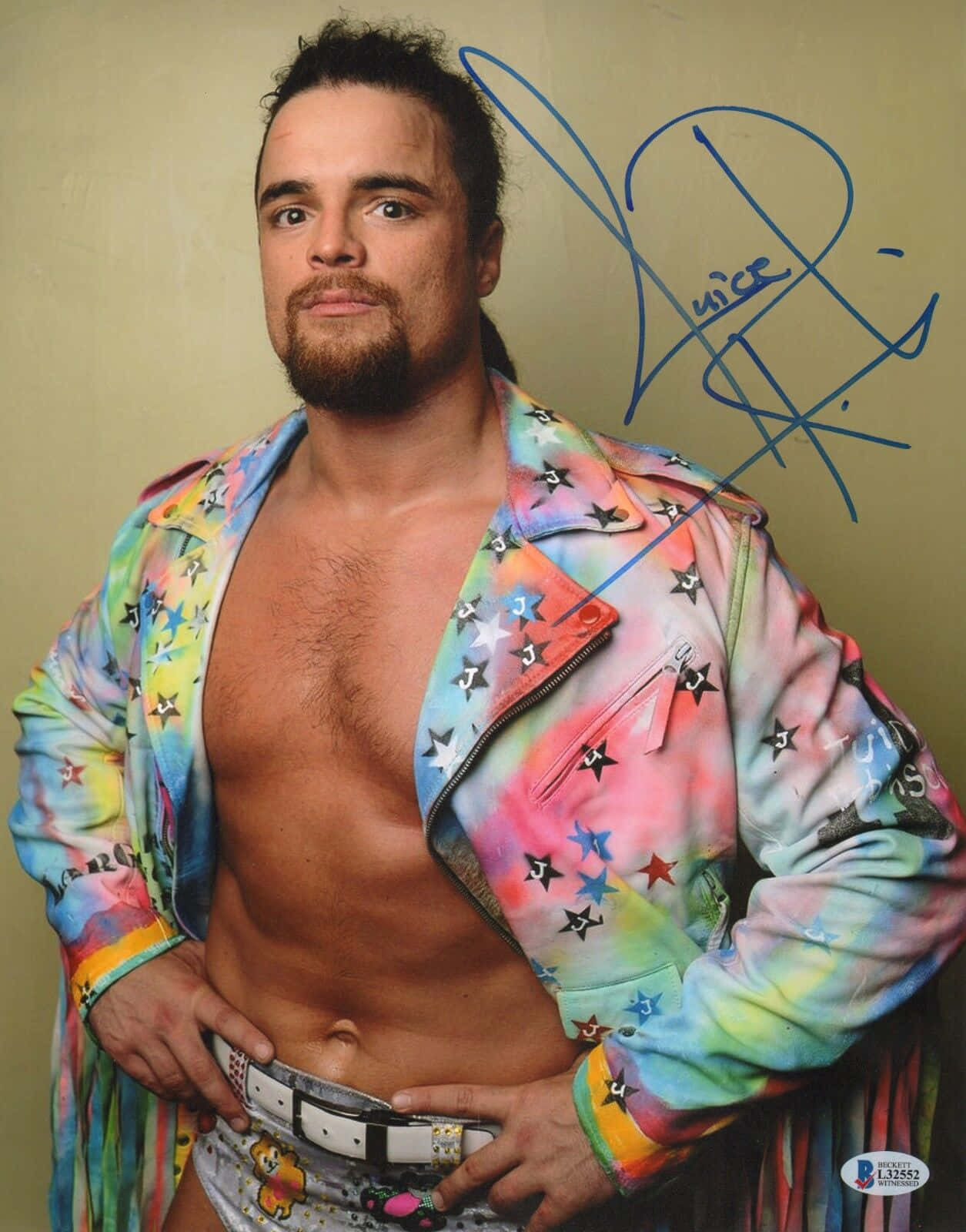 Wrestling Icon Juice Robinson In Vibrant Suit Background