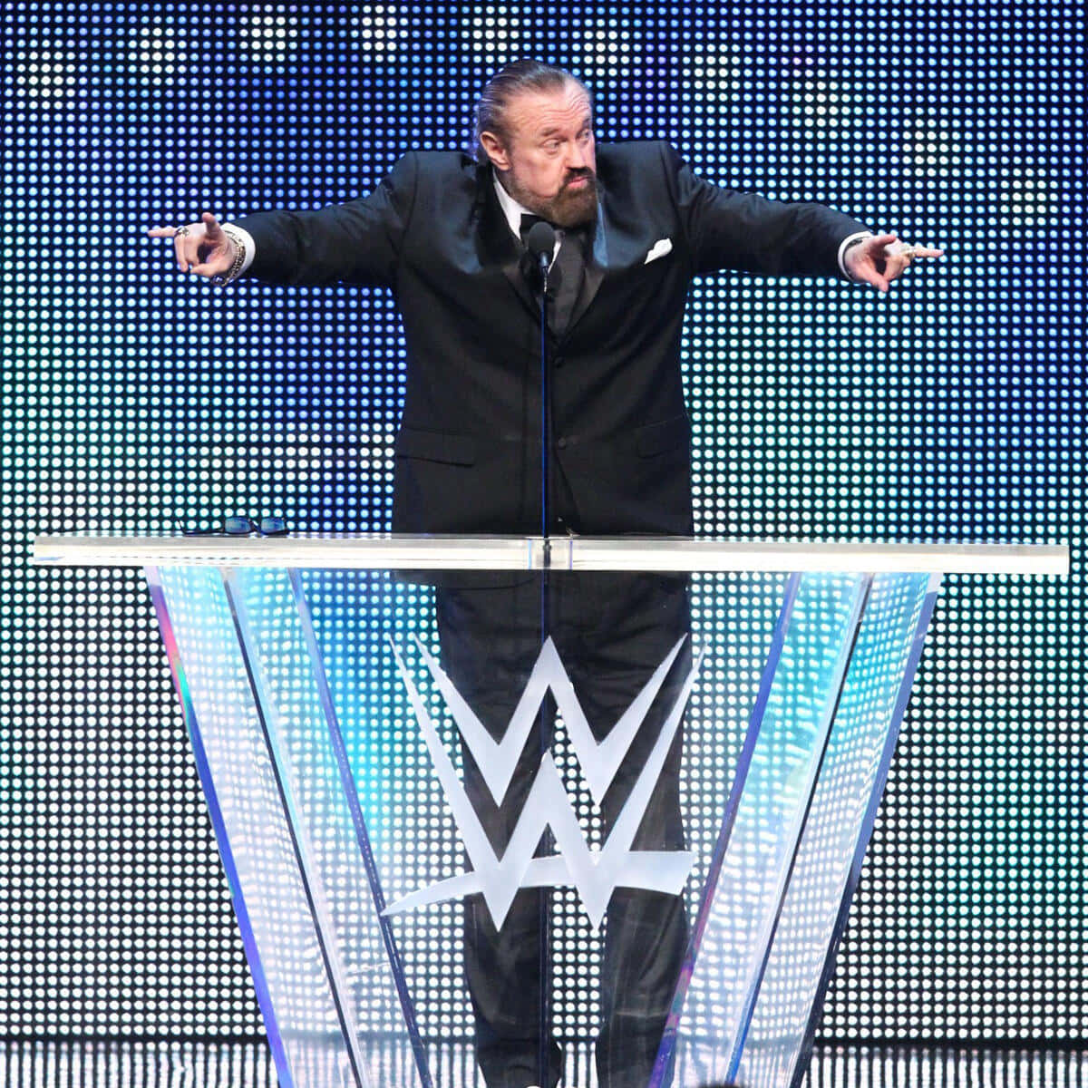 Wrestling Legend Speakingat W W E Event Background
