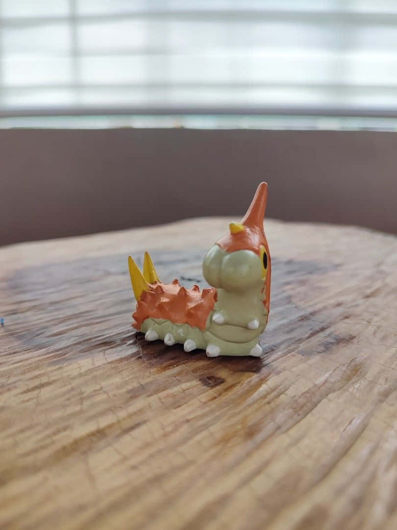 Wurmple Collectible Figurine Toy Background
