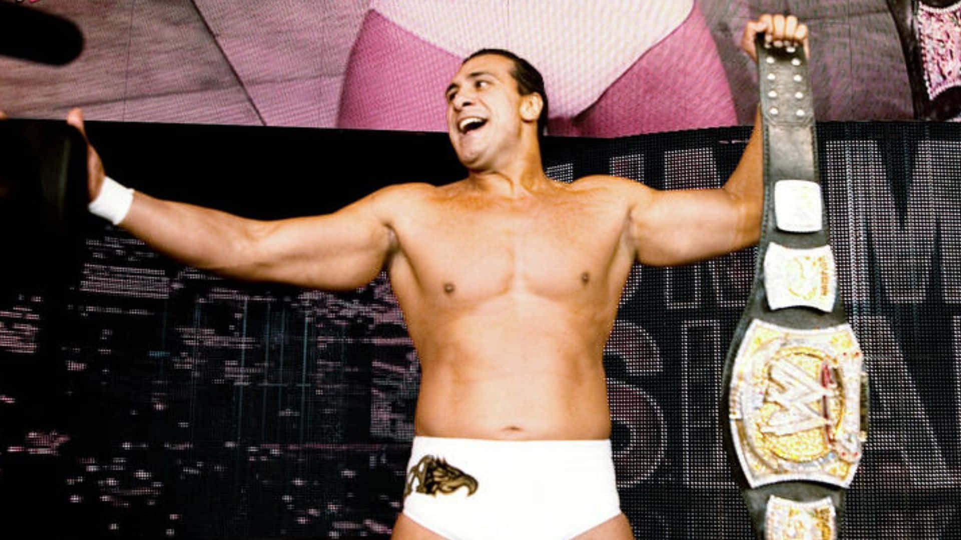 Wwe Alberto Del Rio Holding Belt Background