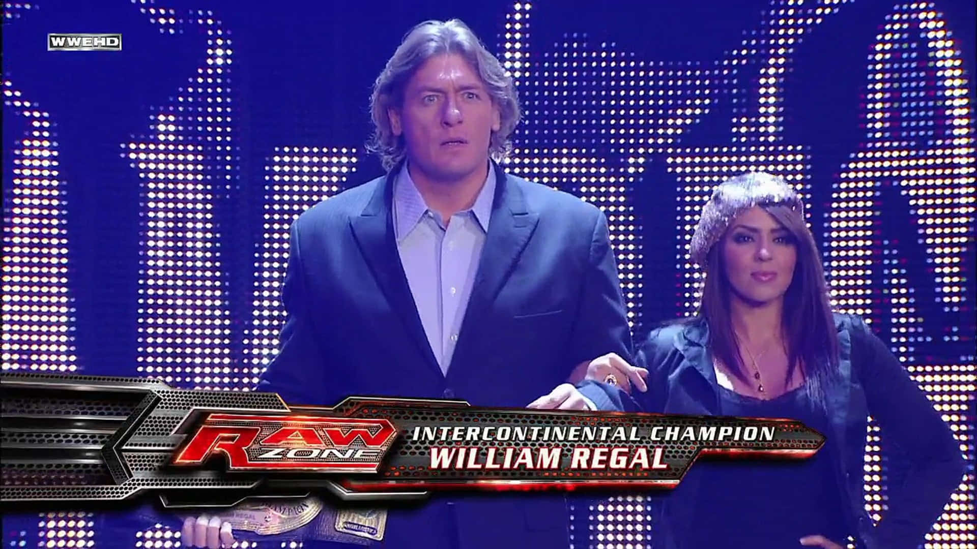 Wwe Legend William Regal Standing Firm In The Ring Background