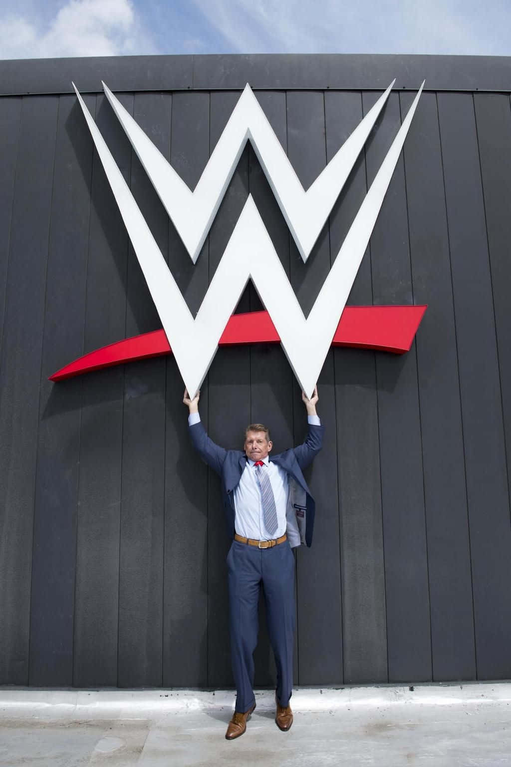 Wwe Logo And Vince Mcmahon Background