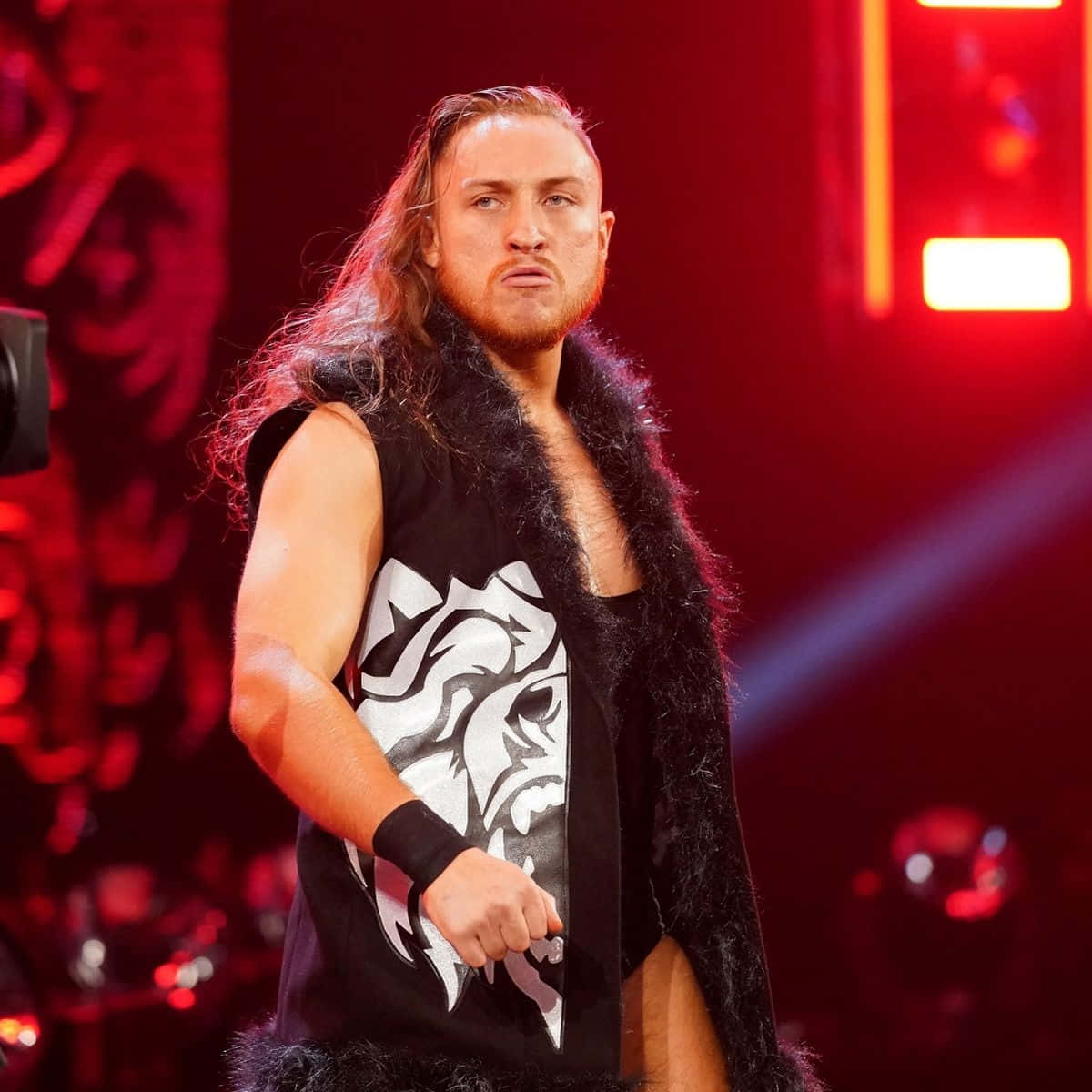 Wwe Star Pete Dunne In Action Background