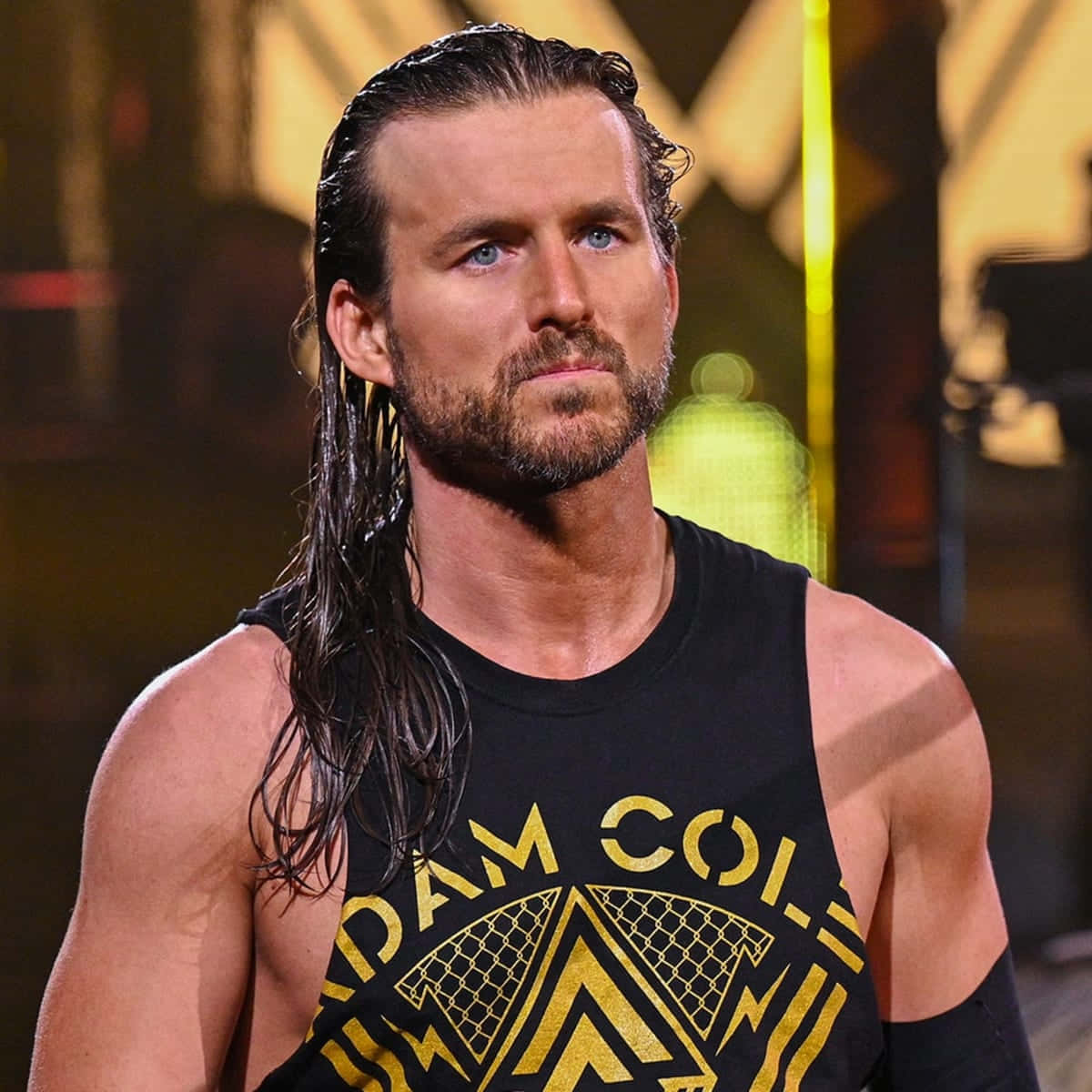 Wwe Superstar Adam Cole With His Intense Poker Face. Background