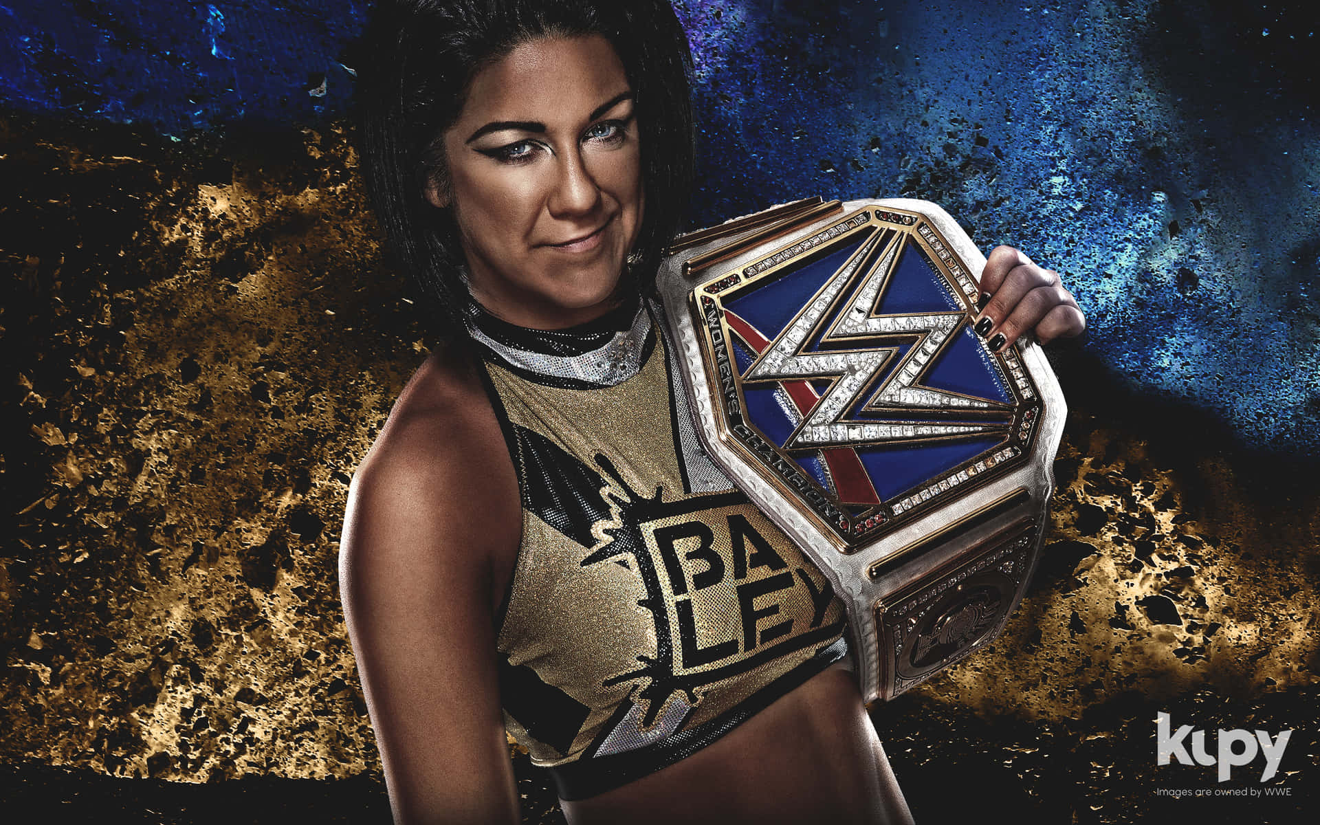 Wwe Wrestler Holding A Gold Belt