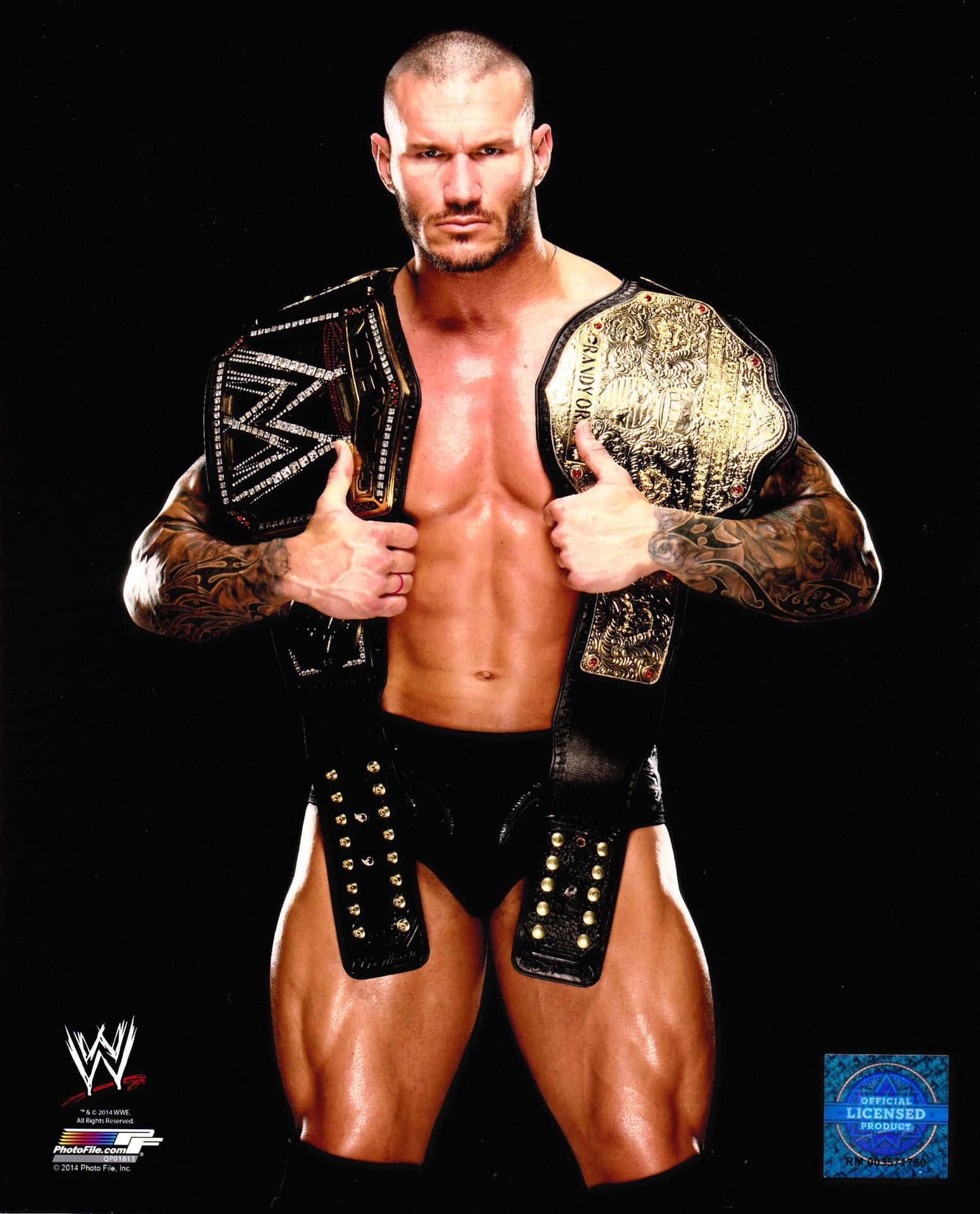 Wwe Wrestler John Cena Holding His Belts