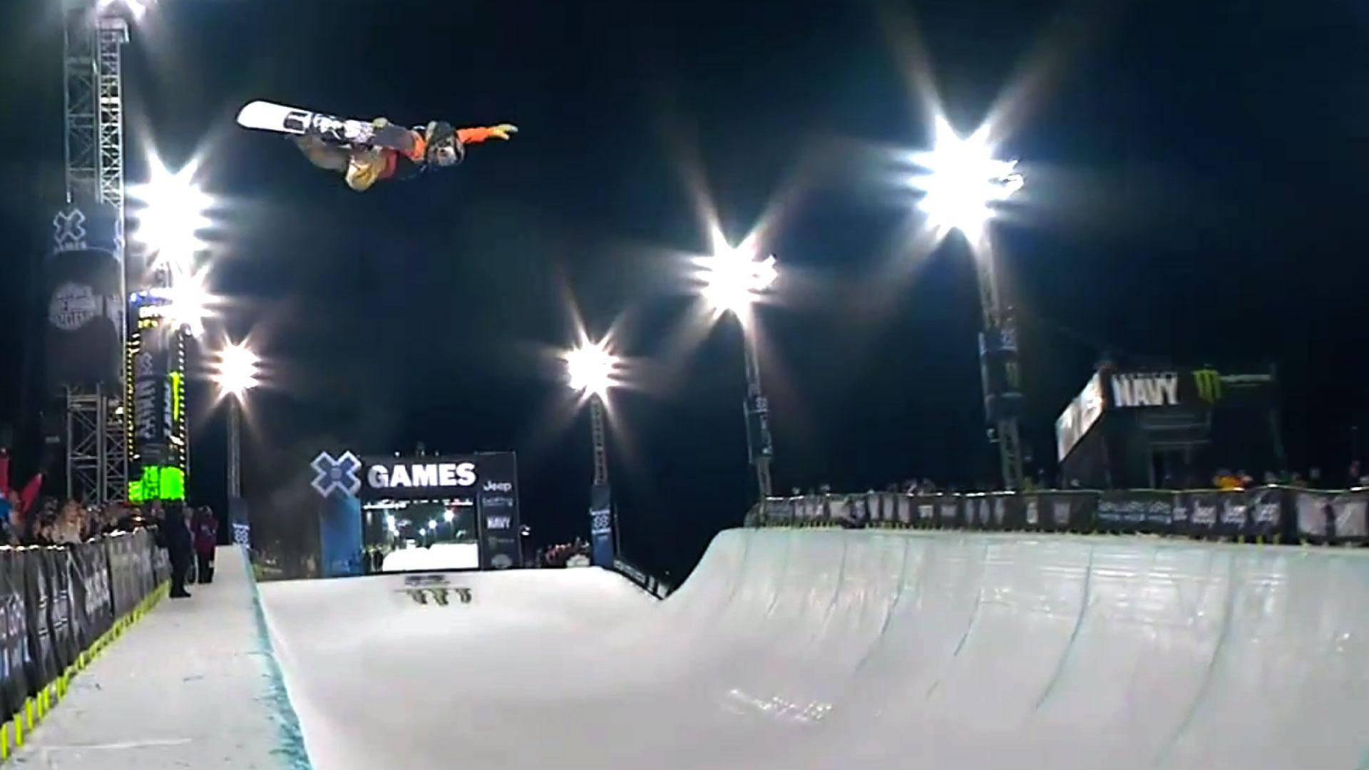 X Games Snowboard Stunt At Night Background