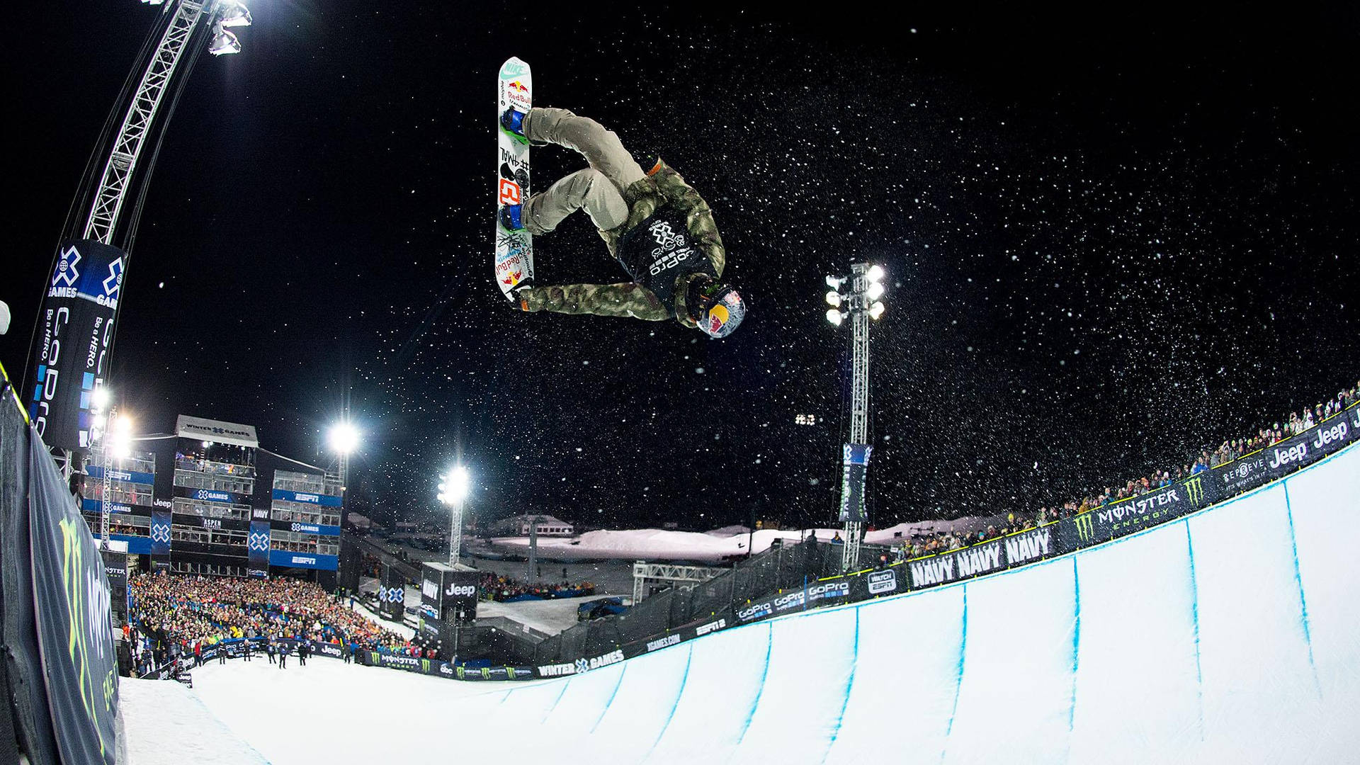 X Games Snowboarding At Night Background