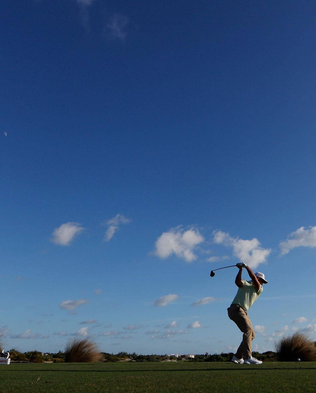 Xander Schauffele Golf Swing Wide Shot Background