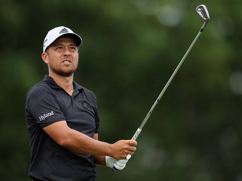 Xander Schauffele Looking Up Background