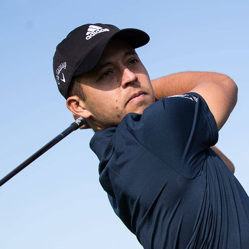 Xander Schauffele Swinging A Golf Club