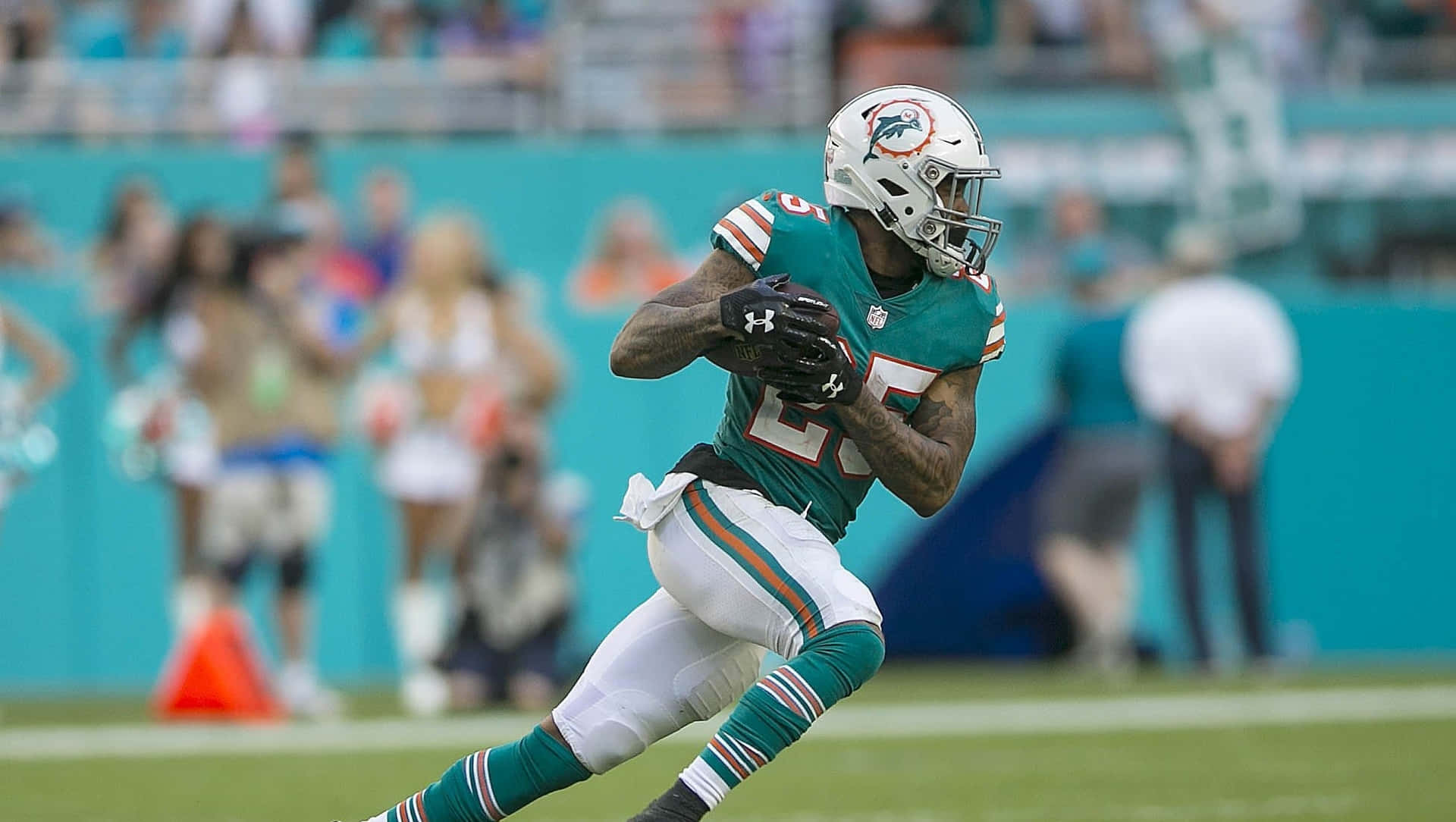 Xavien Howard Miami Dolphins Running Background