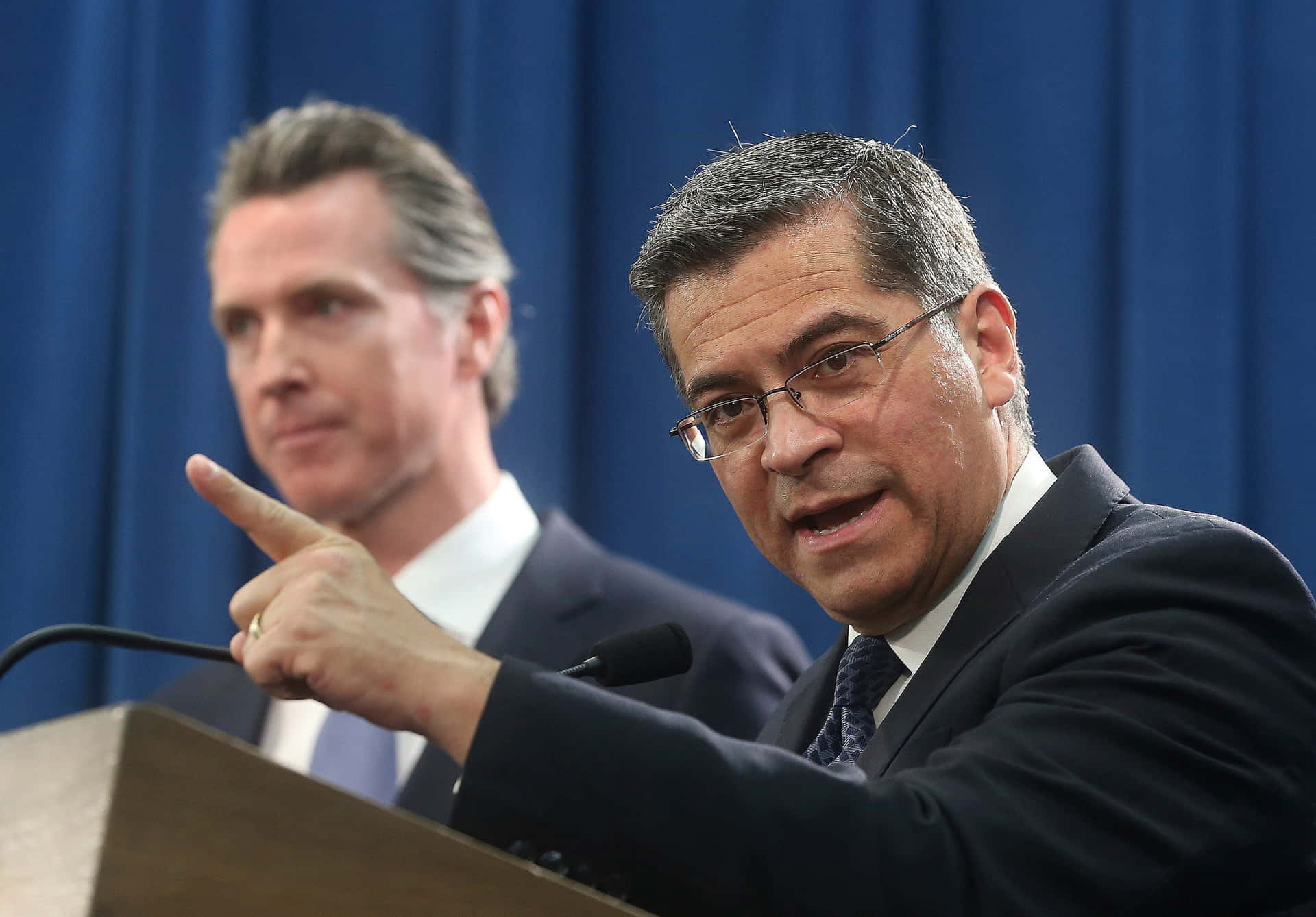 Xavier Becerra Delivering A Passionate Speech Background