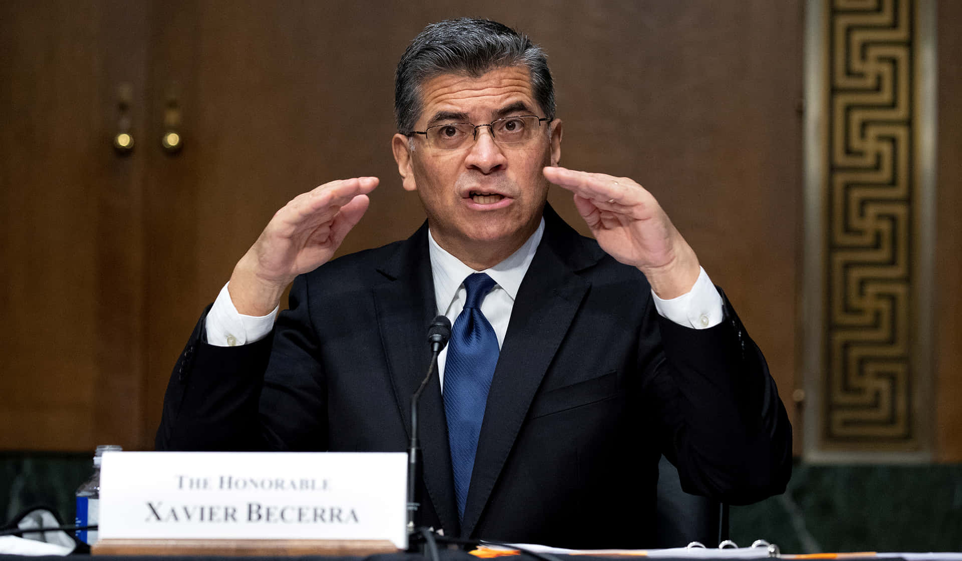 Xavier Becerra Delivering A Passionate Speech Background