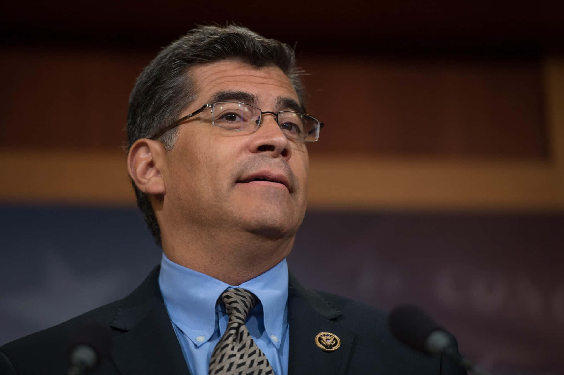 Xavier Becerra During A Talk Background