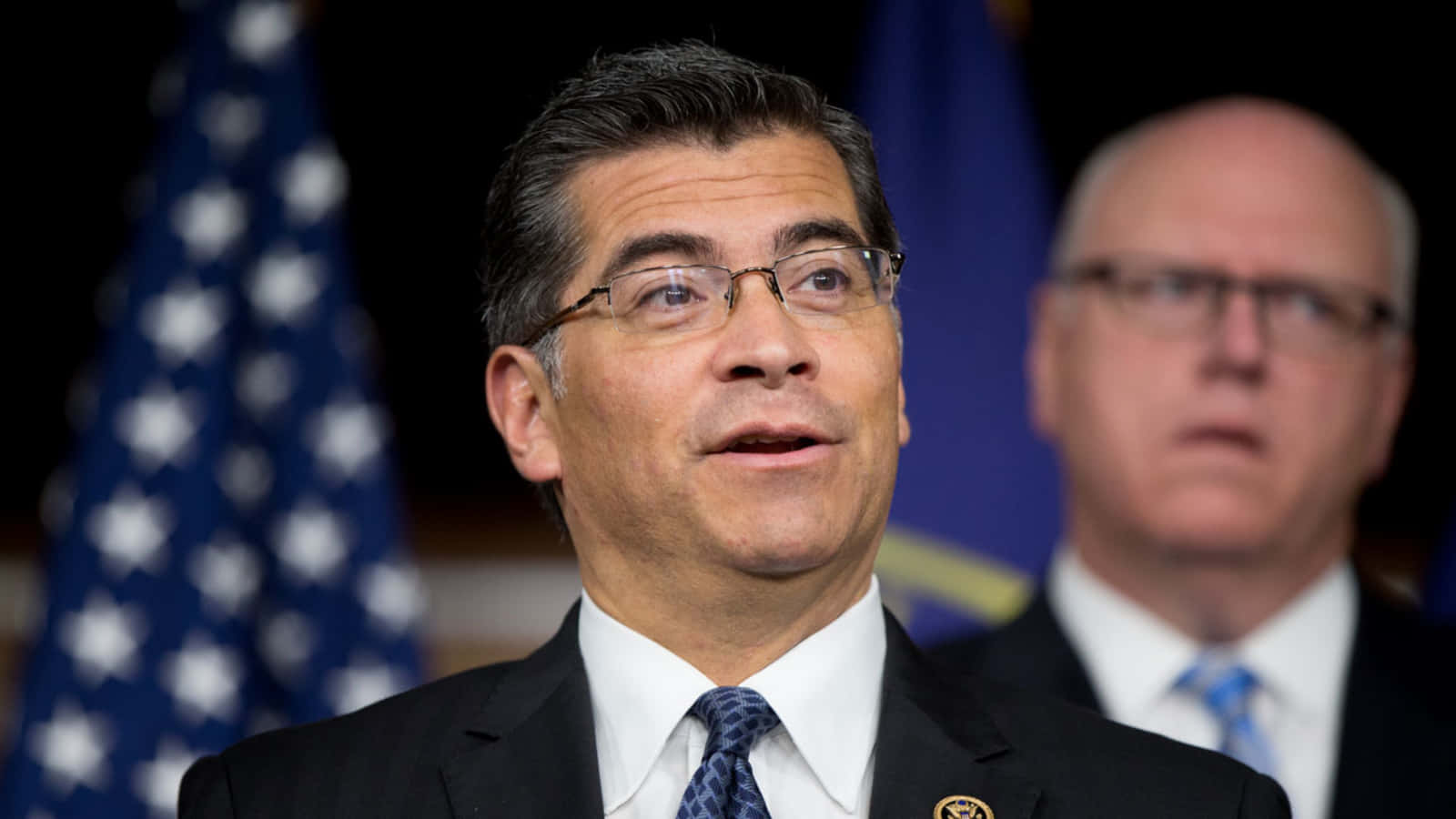Xavier Becerra Pleasantly Surprised Background