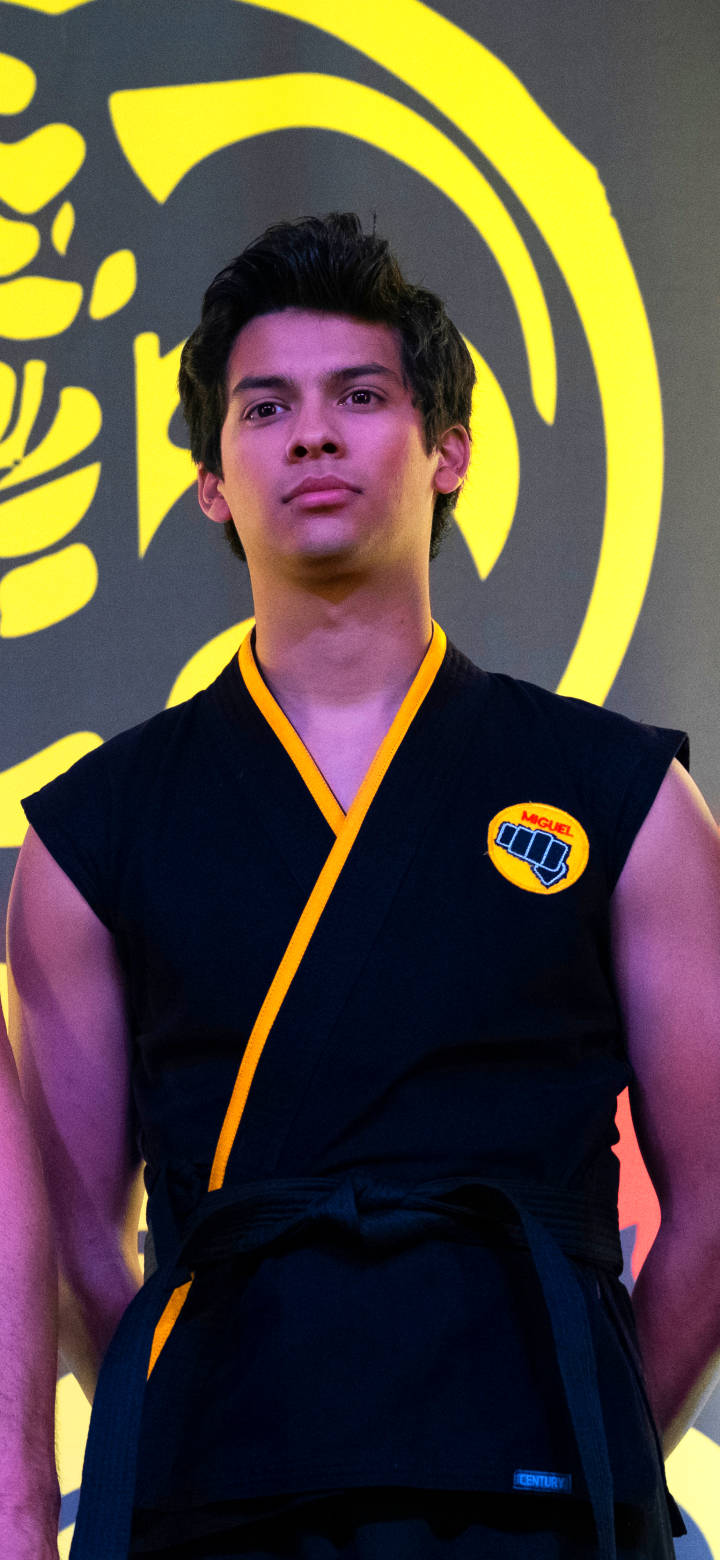 Xolo Maridueña Of Cobra Kai Phone Background