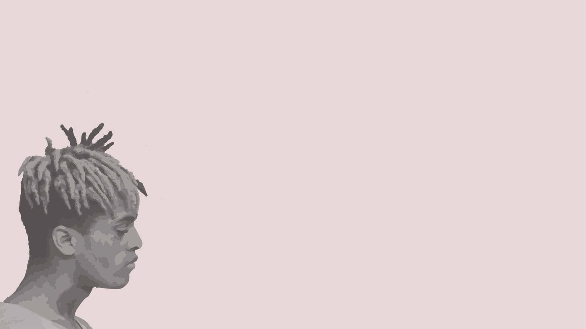 Xxxtentacion In Front Of A Computer Background