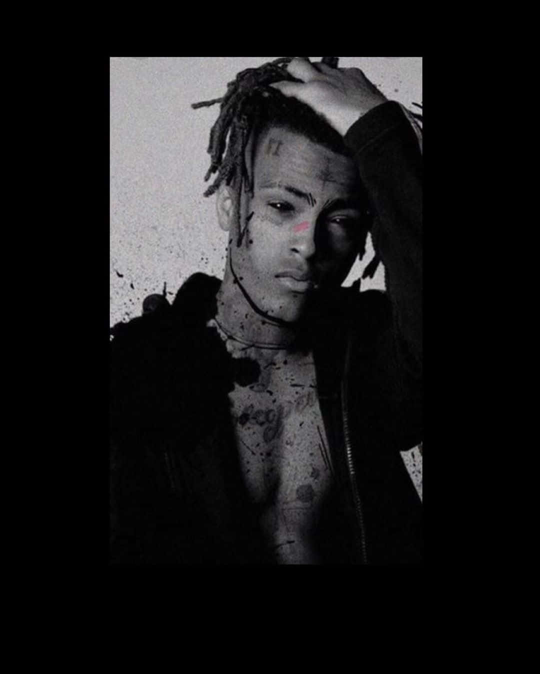 Xxxtentacion Pfp Brushing Hair Background