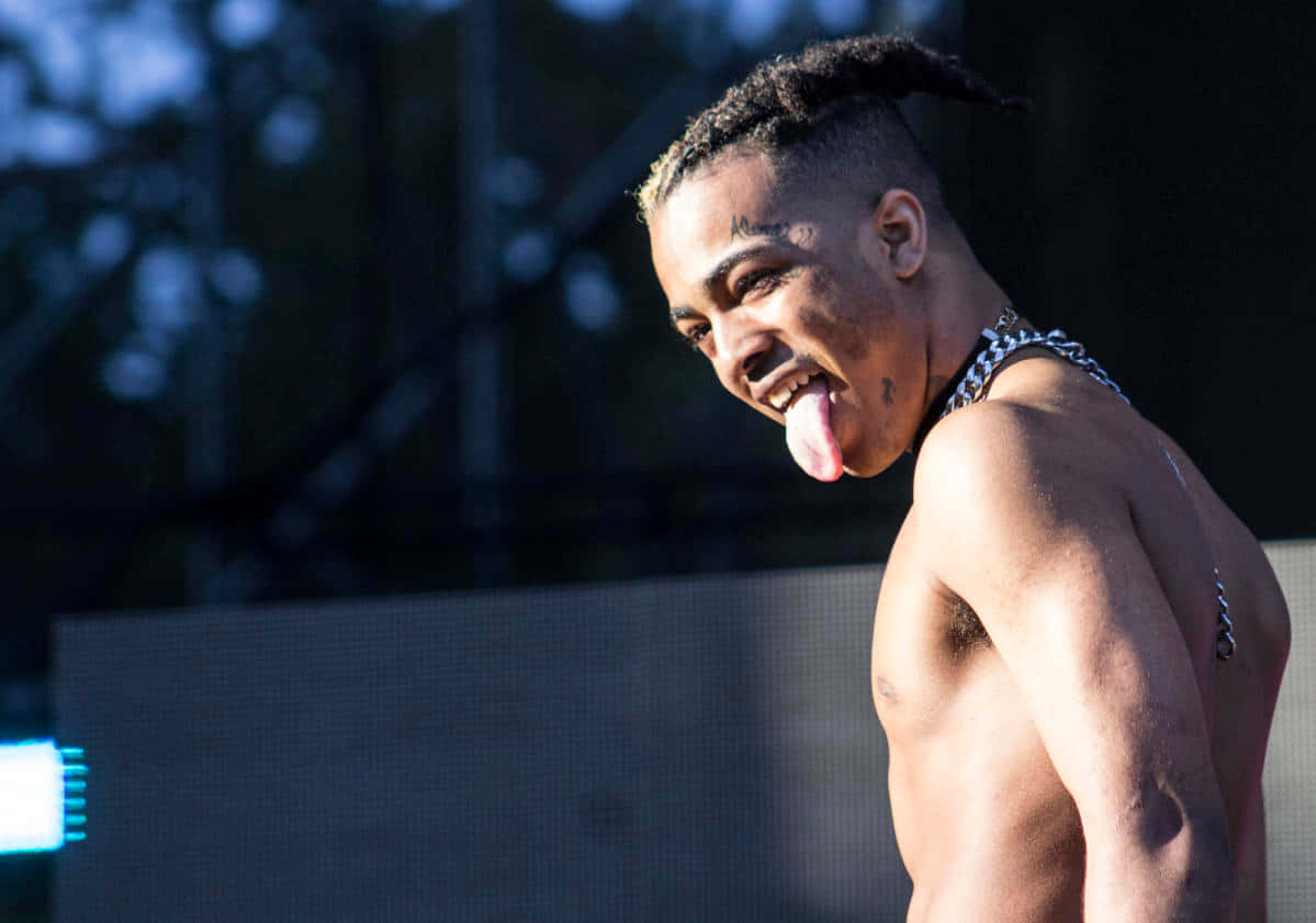 Xxxtentacion Pfp Tongue Out Background