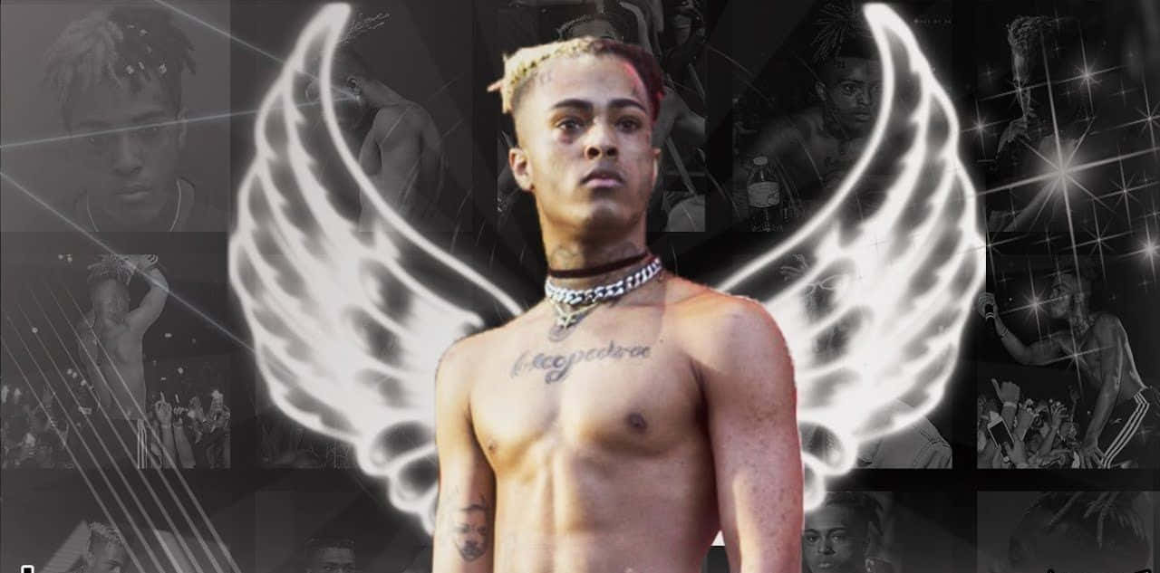 Xxxtentacion Working On His New Music On A Laptop Background
