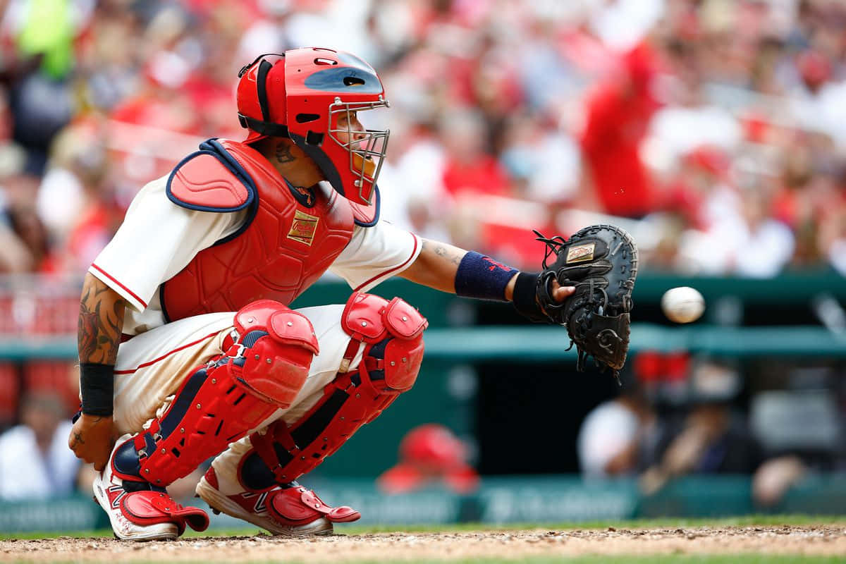 Yadier Molina Of The St. Louis Cardinals On The Playing Field Background
