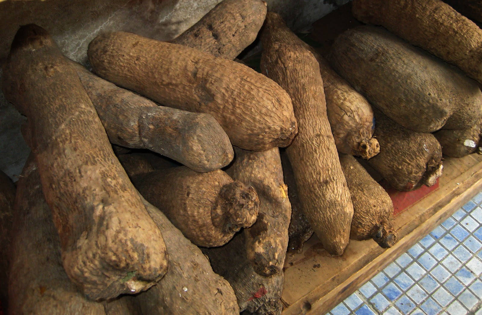 Yam On Wood Board Background