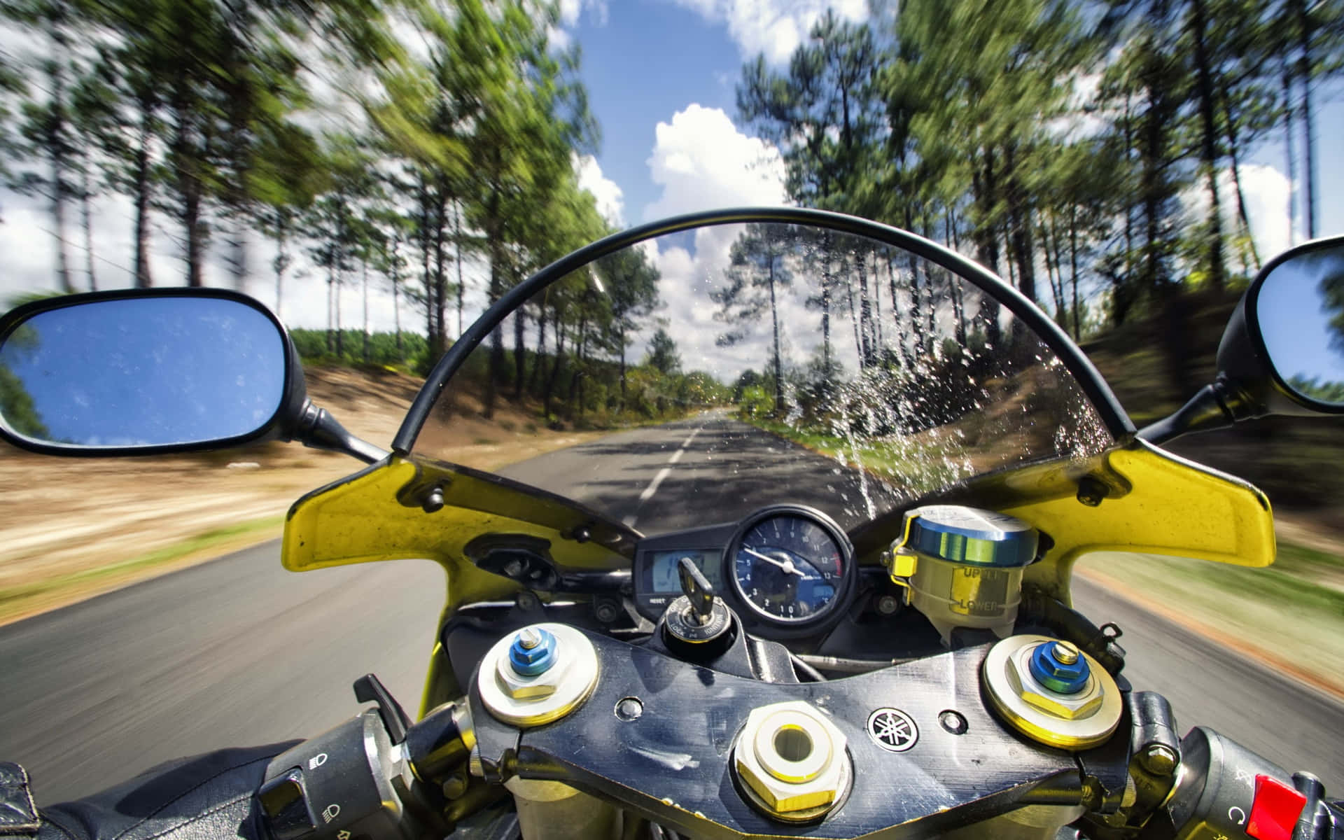 Yamaha Motorcycle Ride Through Forest Background