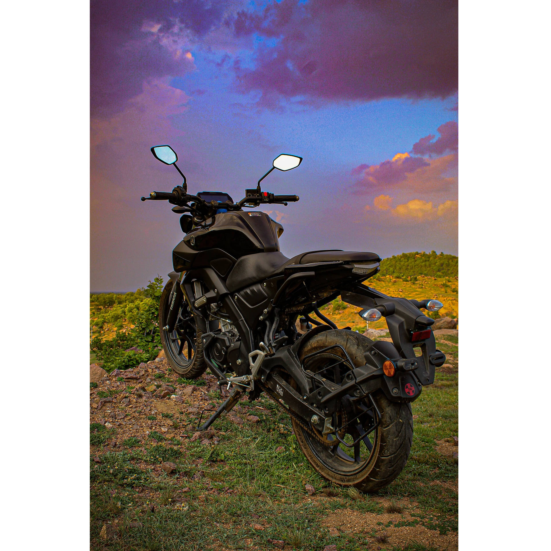 Yamaha Mt 15 Parked On A Cliff Background