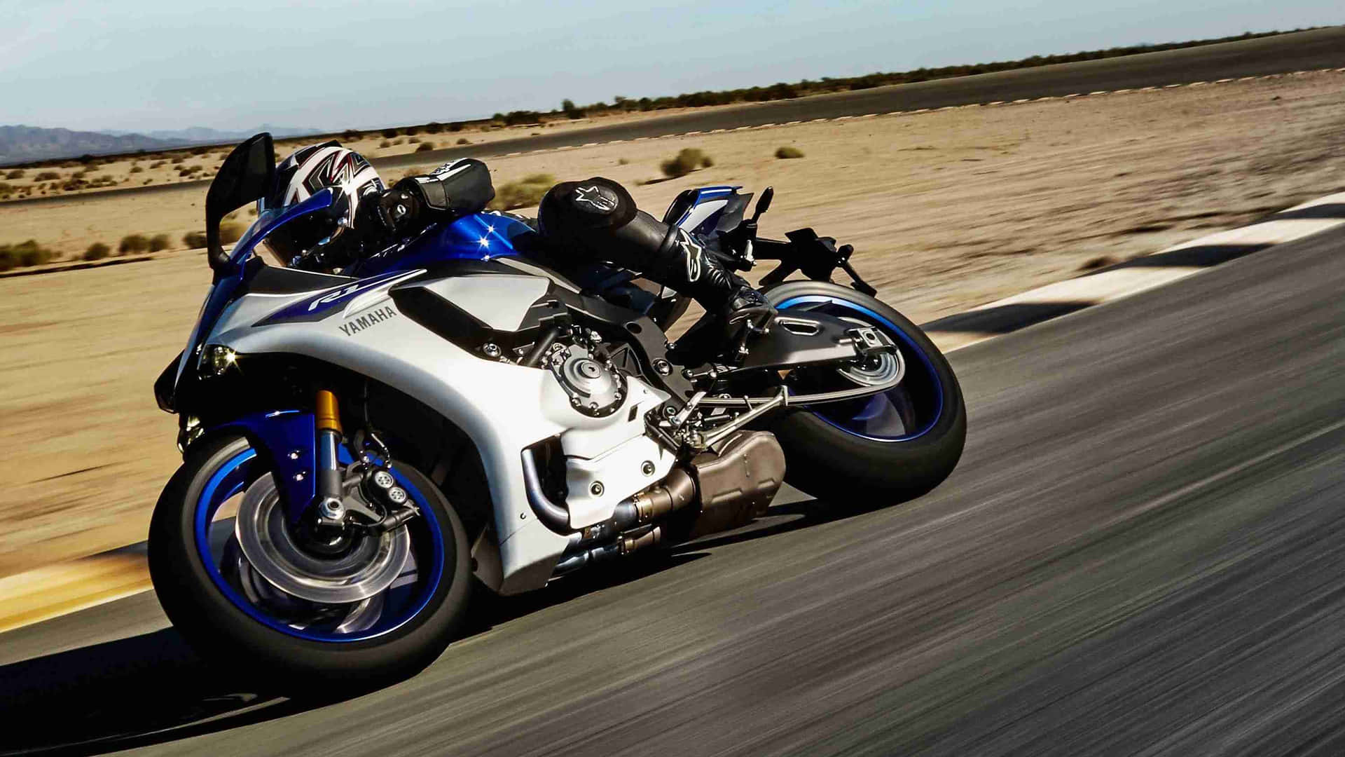 Yamaha Sportbike Speeding Desert Road Background