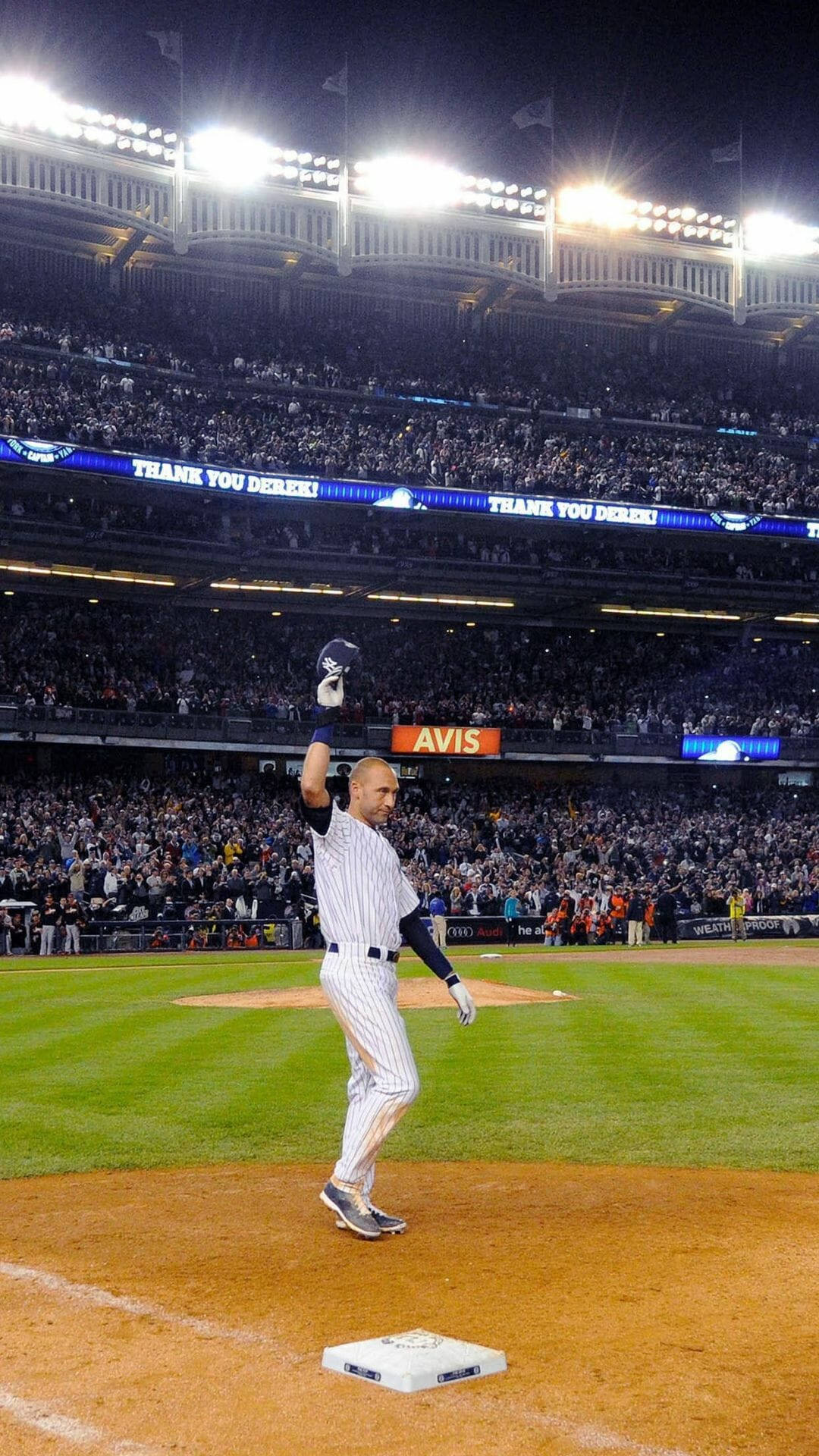 Yankees Derek Hold Up Hat Background