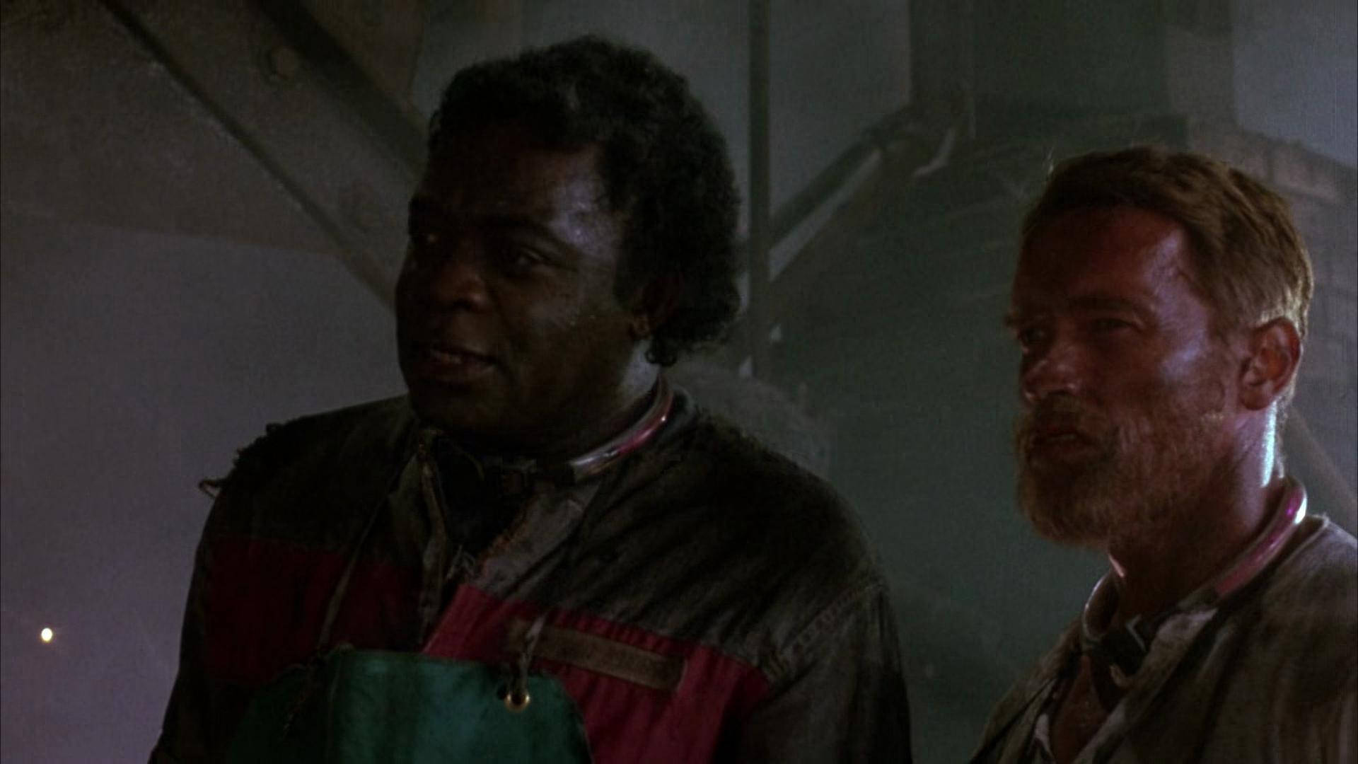 Yaphet Kotto And Arnold Schwarzenegger In The Running Man Background