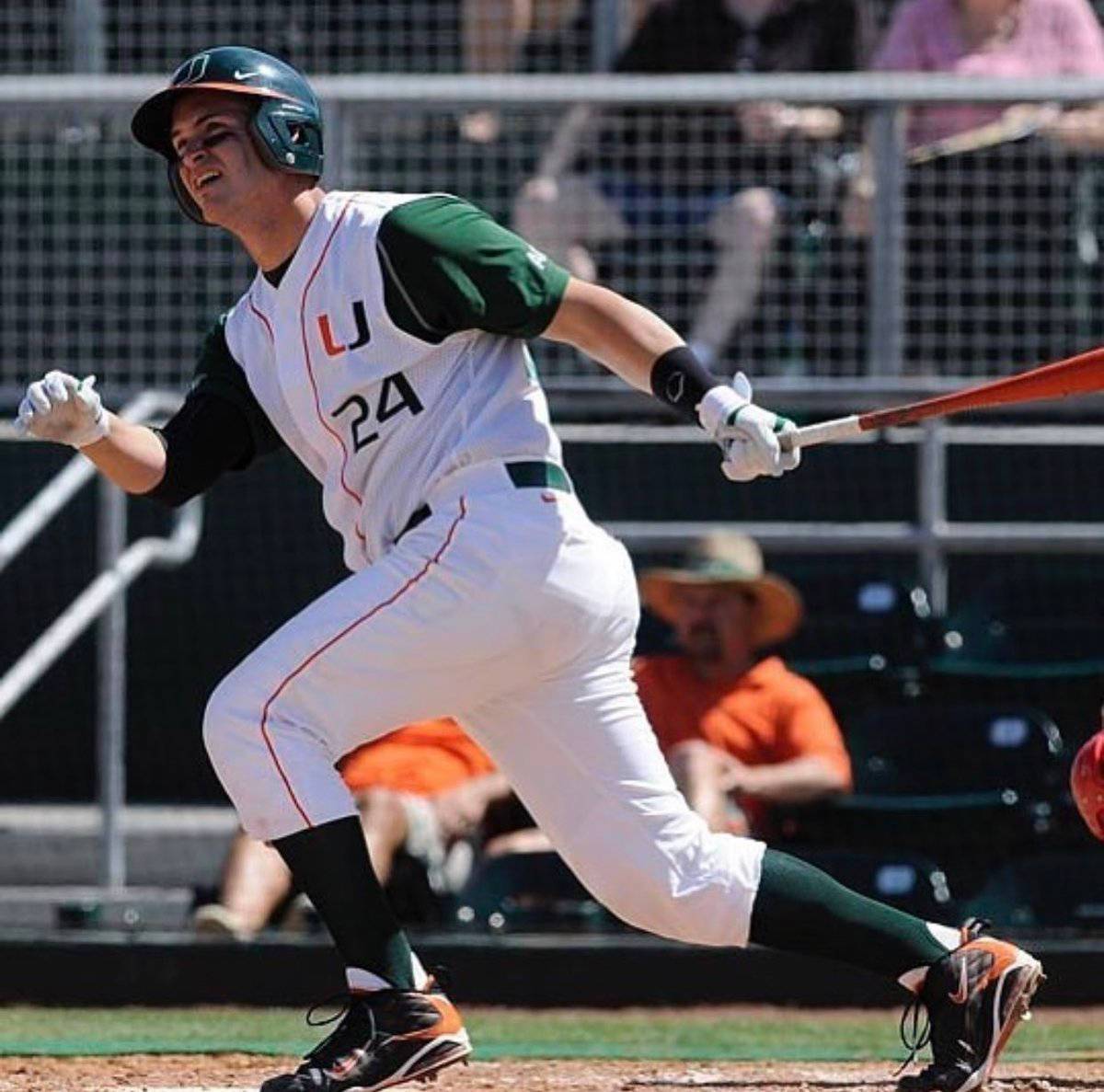 Yasmani Grandal In Green And White Uniform Background