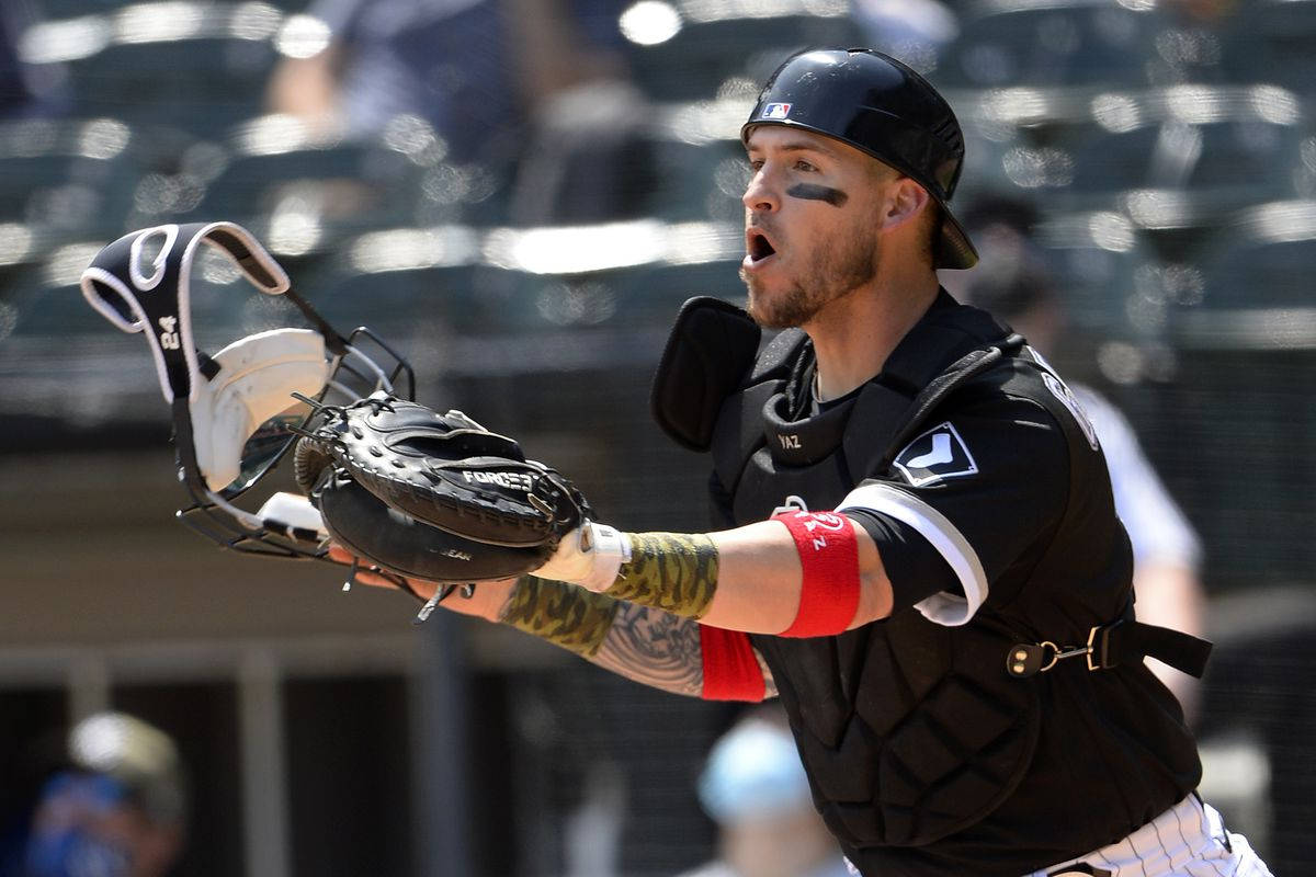 Yasmani Grandal Shouting With Face Paint Background