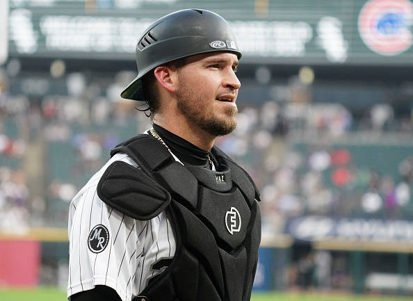 Yasmani Grandal Wearing Black Catcher Gear Background