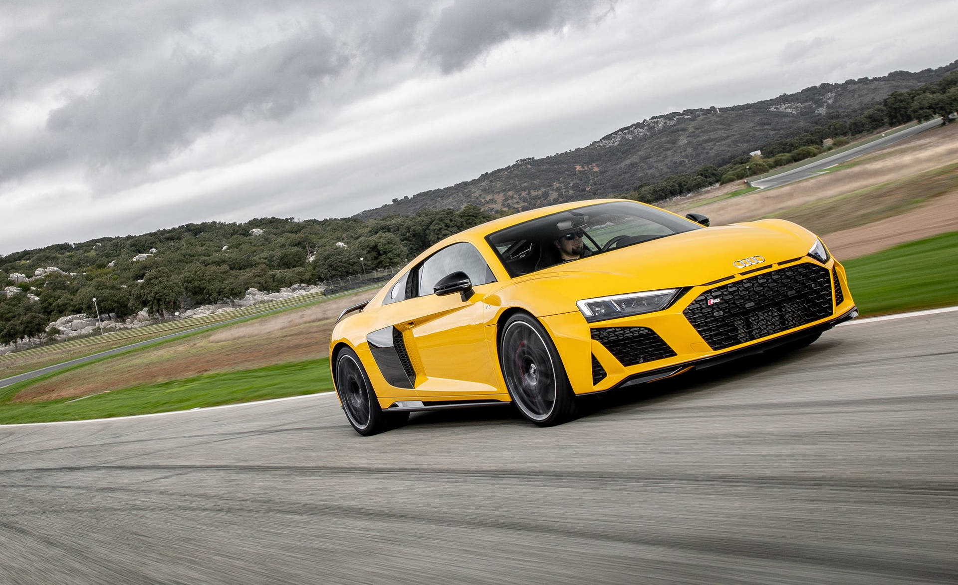 Yellow Audi R8 On Road Background