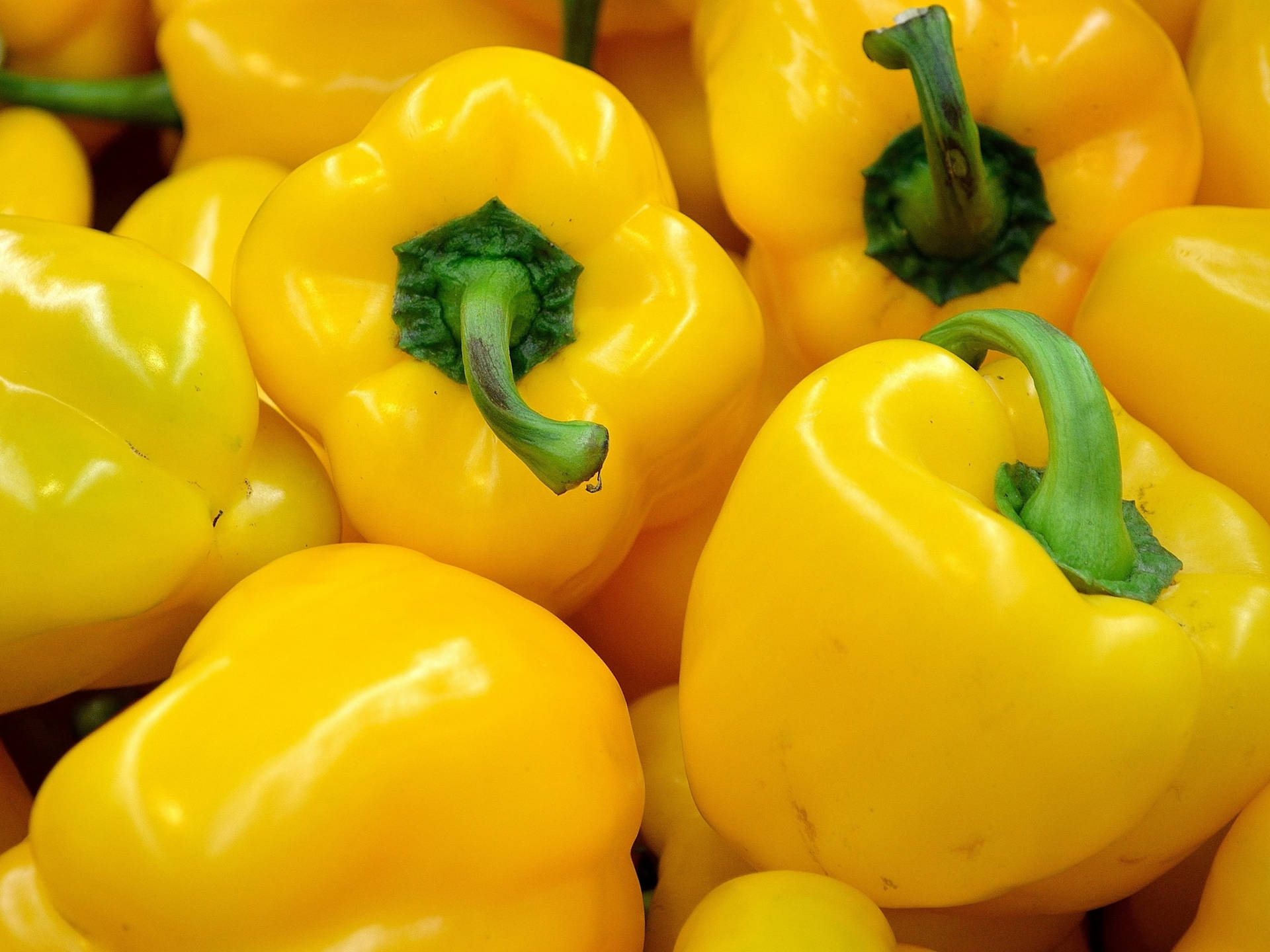 Yellow Bell Pepper Pile Close Up Shot Background