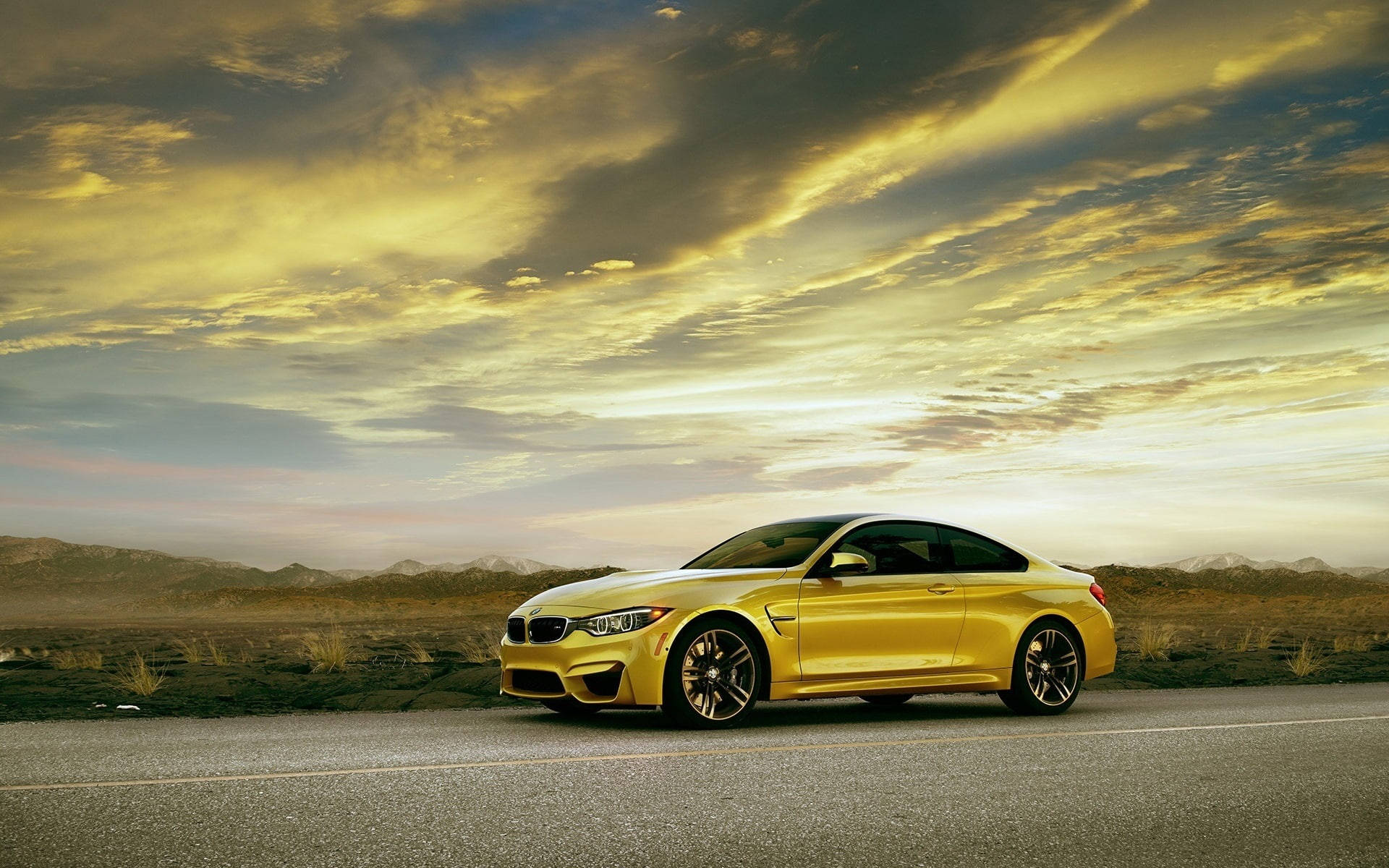 Yellow Bmw M4 On The Road Background