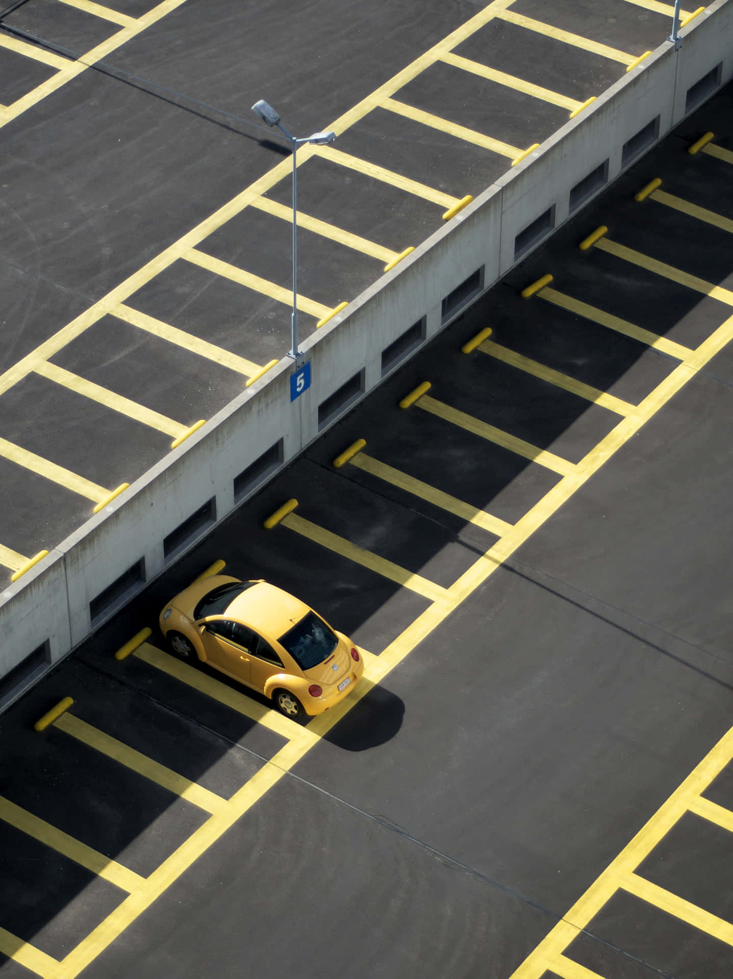 Yellow Car In Parking Lot