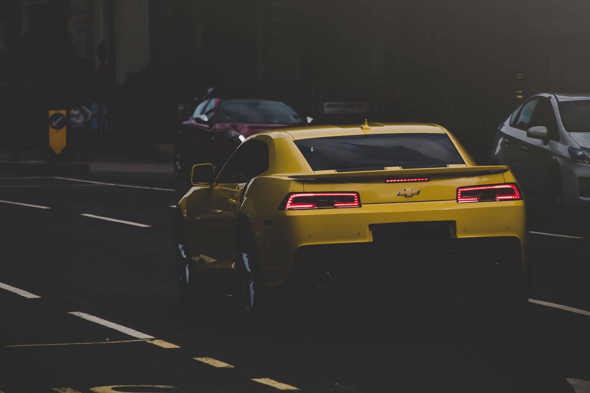 Yellow Chevrolet Car On Road Background