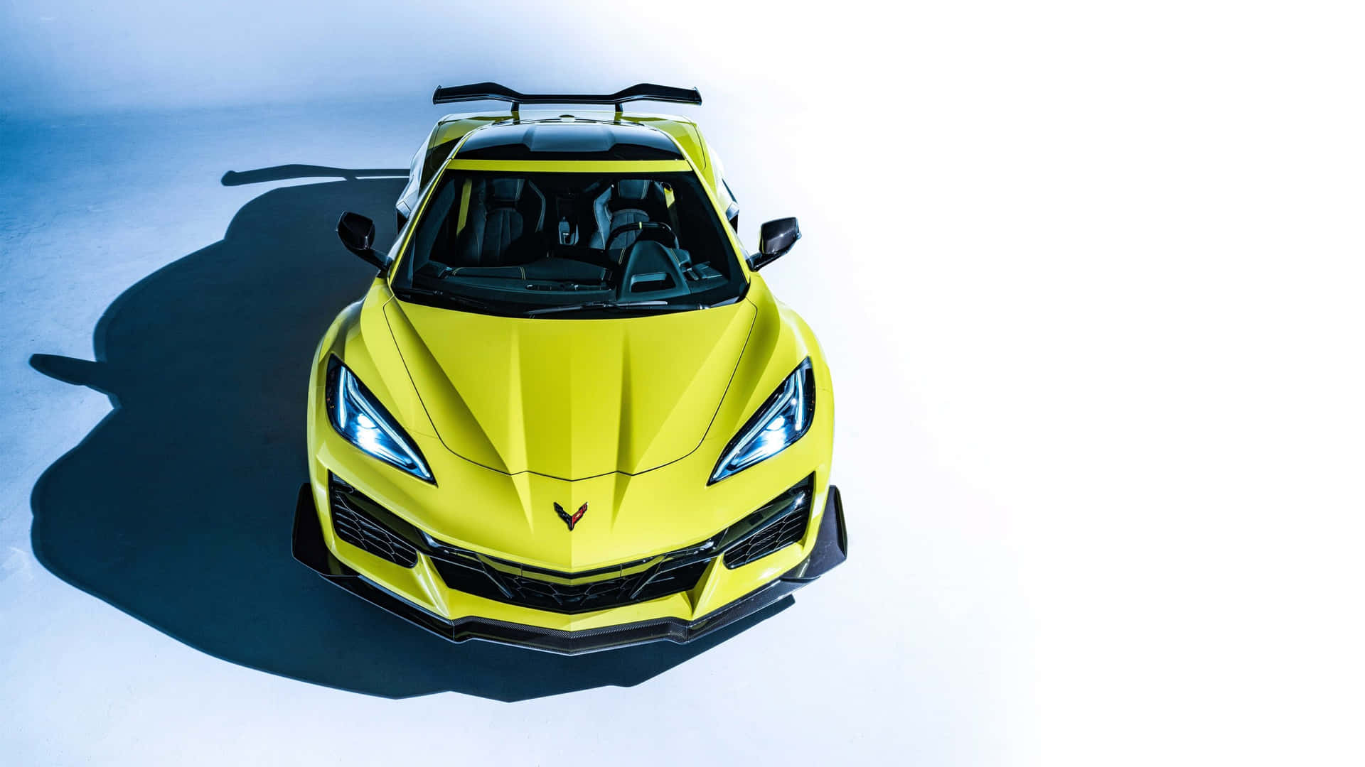 Yellow Corvette C8 Top View Background