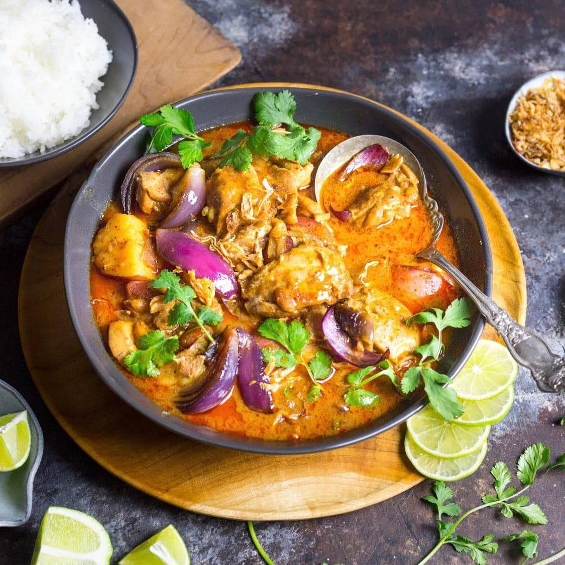 Yellow Curry With Mint Leaves And Lemon Background