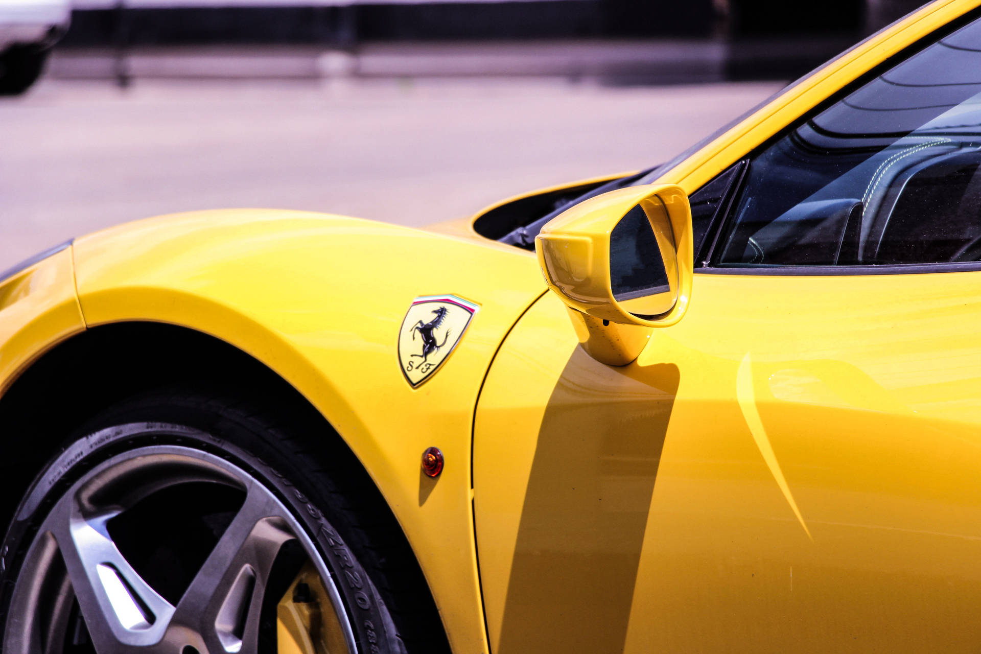 Yellow Ferrari Sports Car Background