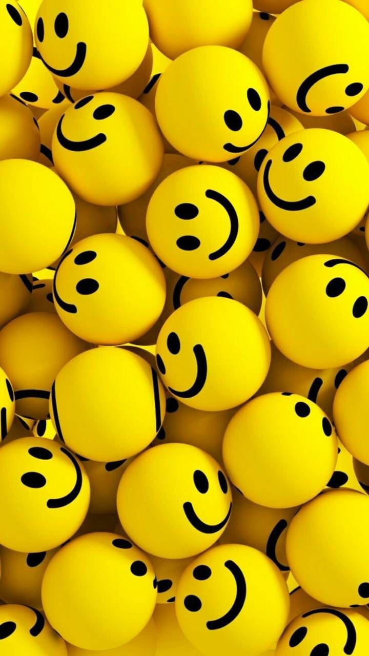 Yellow Happy Smiley Face Stress Balls Background