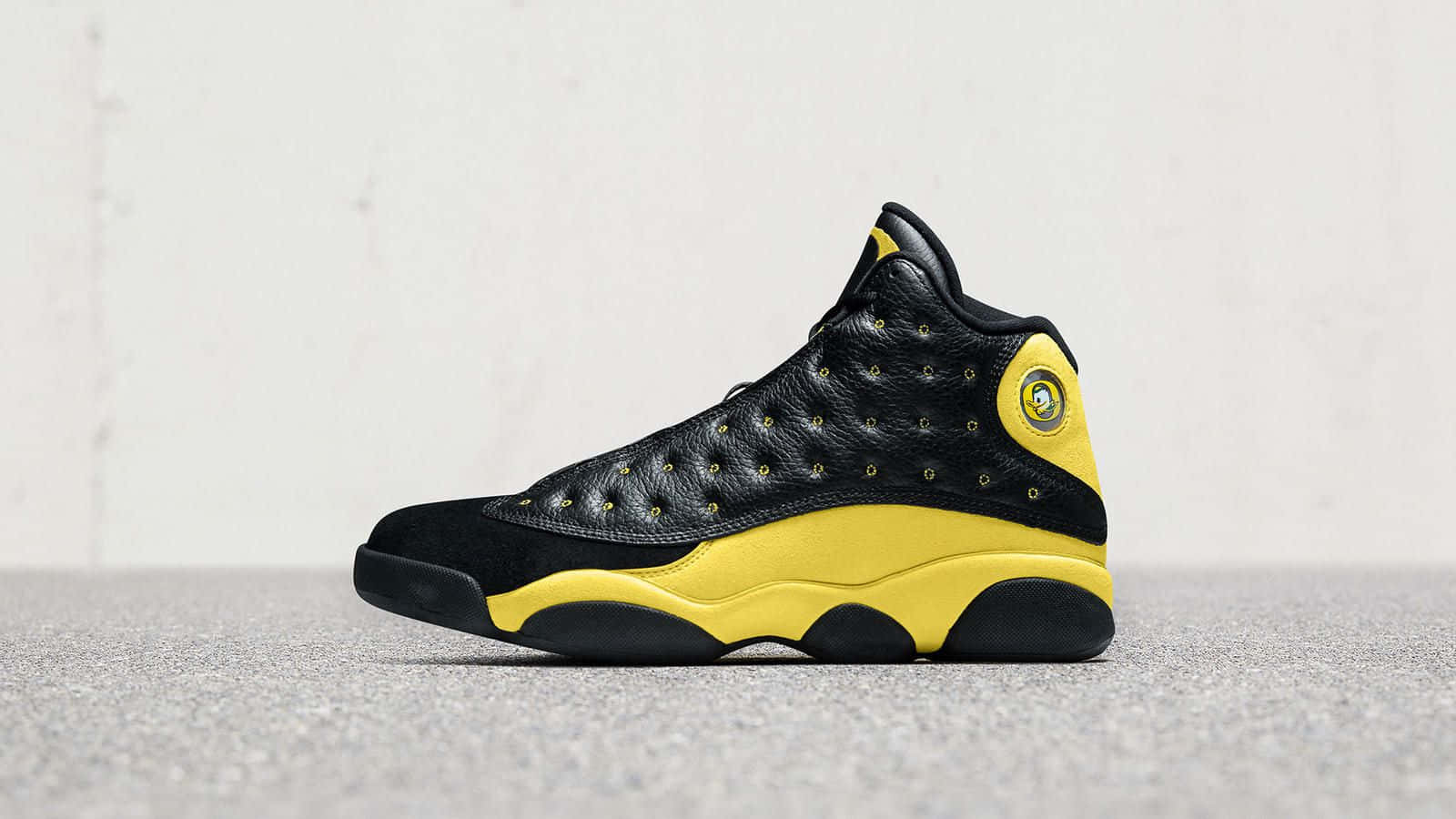 Yellow Jordan School Duck Logo