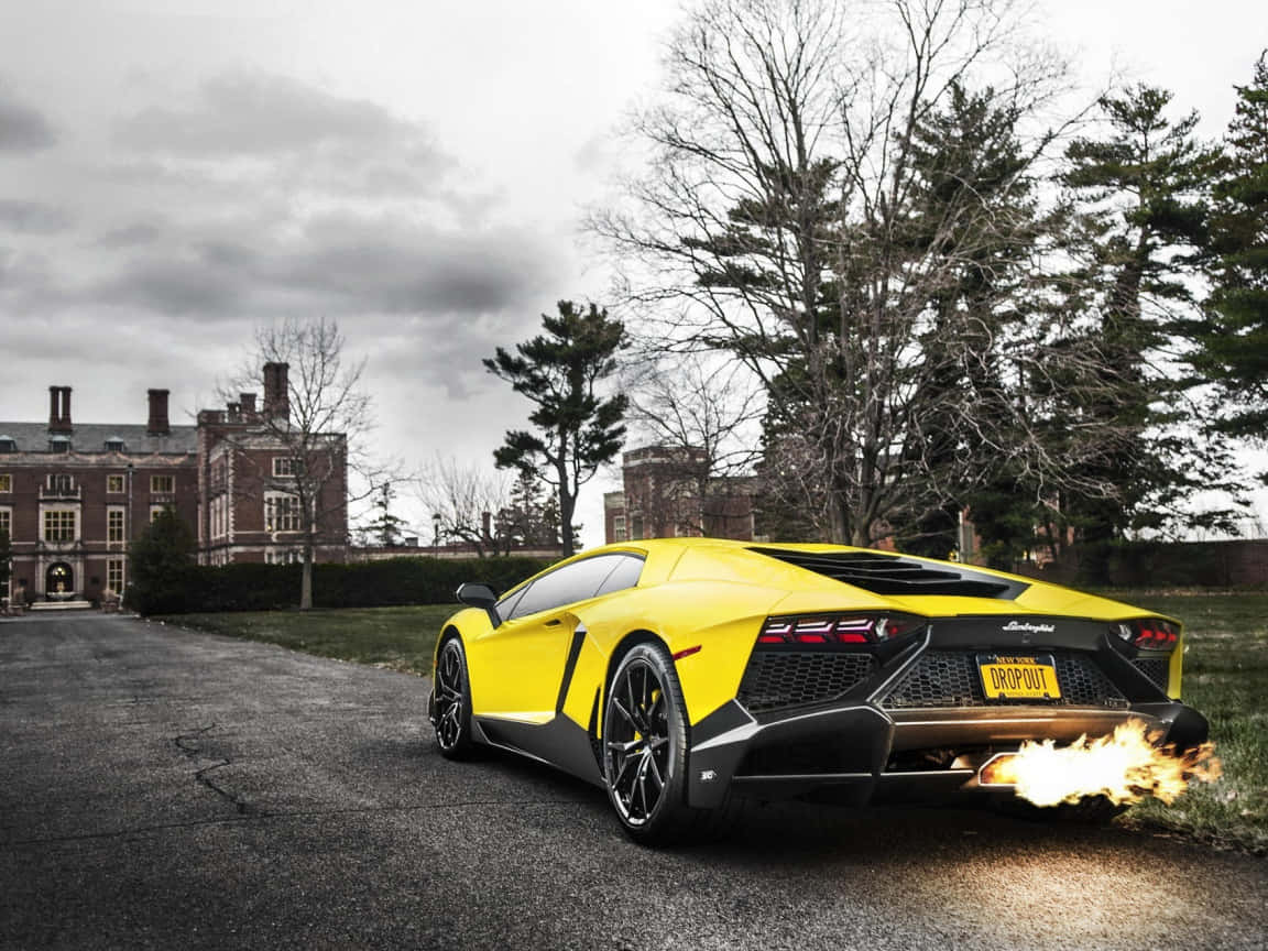 Yellow Lamborghini Aventador Exhaust Flames Background