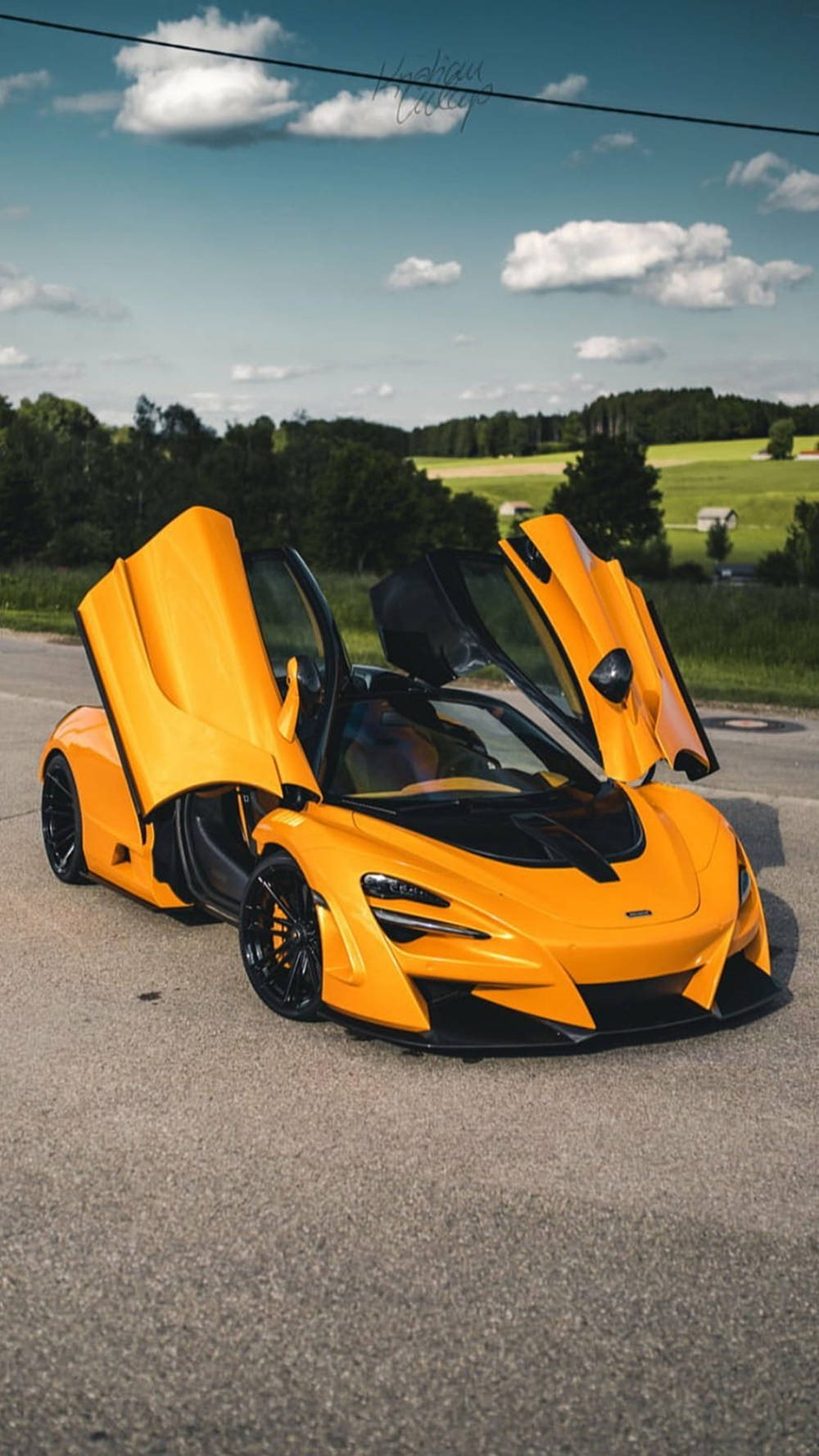 Yellow Mclaren 720s Open Doors Phone Background