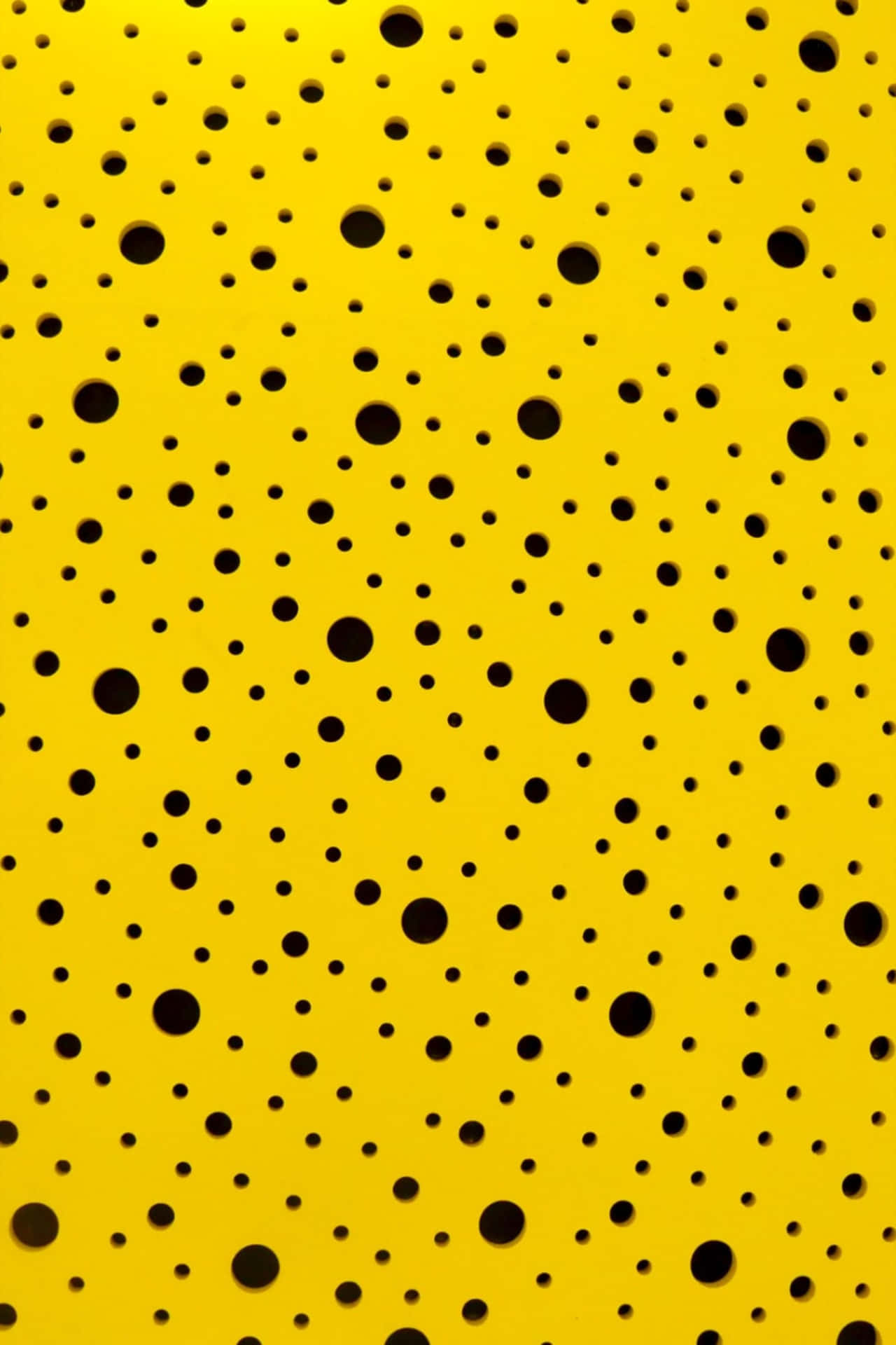 Yellow Perforated Pattern Background