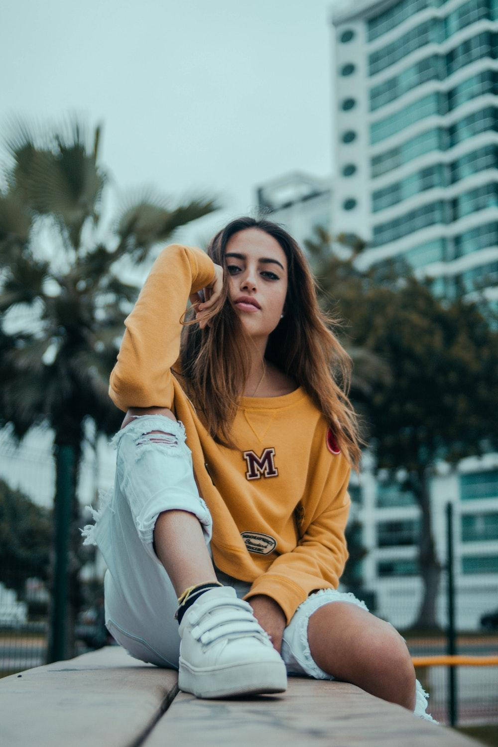 Yellow Sweater Attitude Girl Background